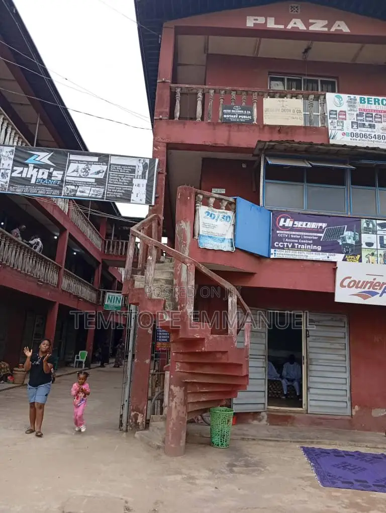 Unique Plaza With 56shops Facing Road in Ikotun/Igando