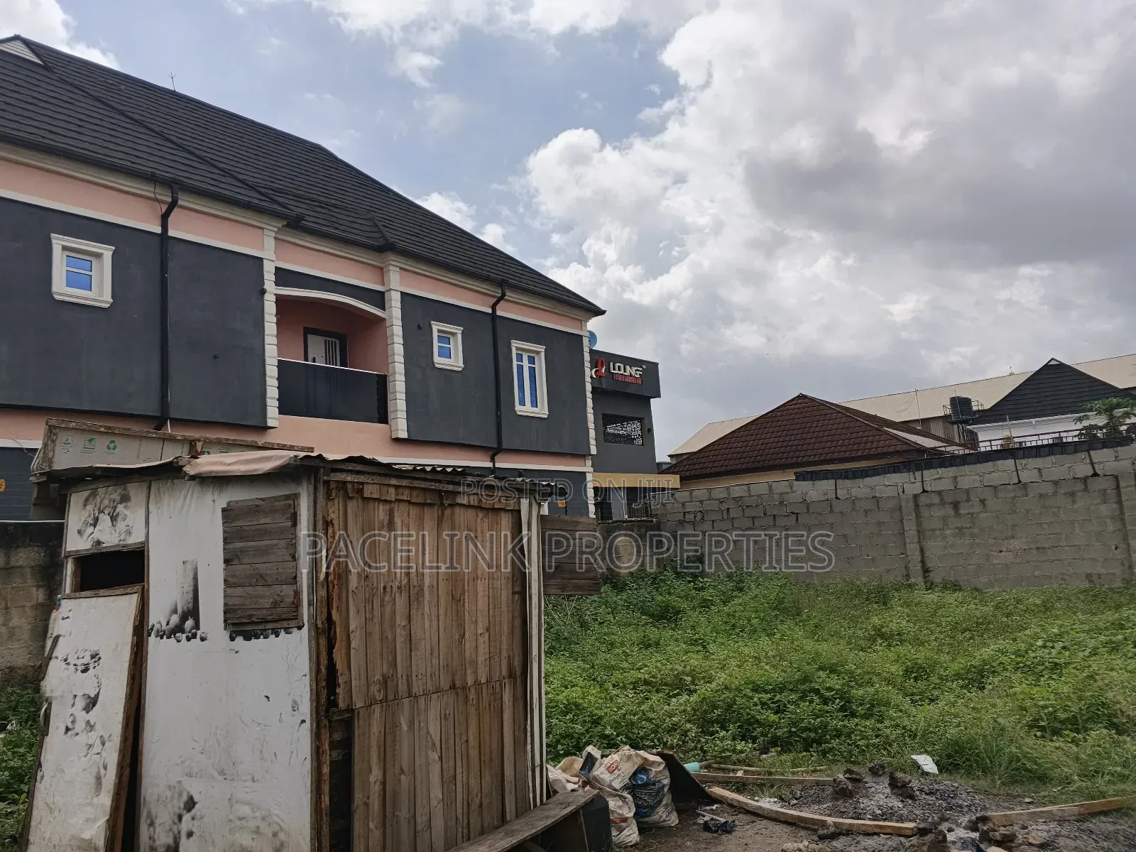 Almost Full Plot of Land Good for Commercial and Residential in Ipaja / Ipaja
