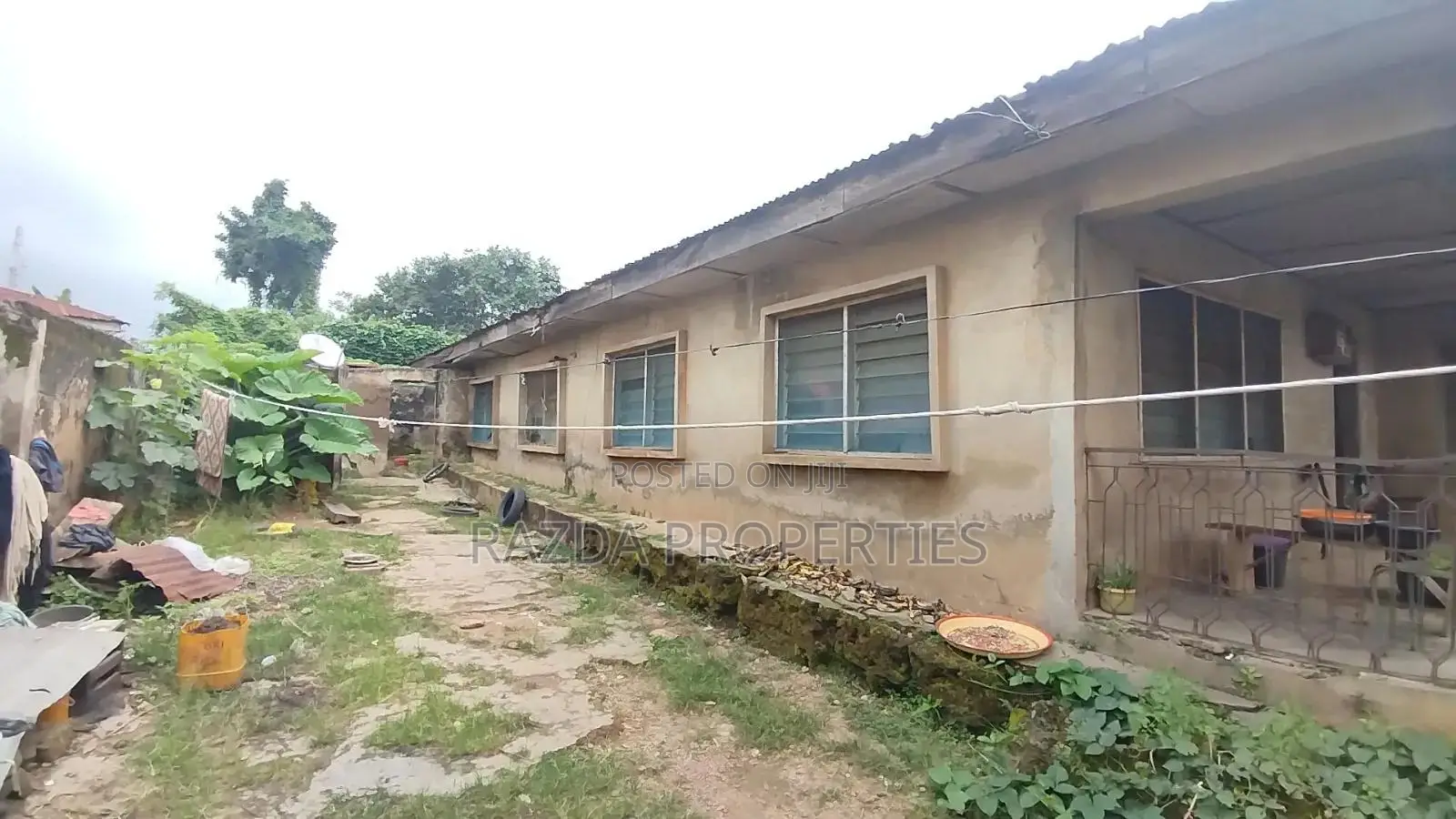 Hot Deal! Land With Demolishable Building Near Oau Road 7 Gate, Ife in Ife