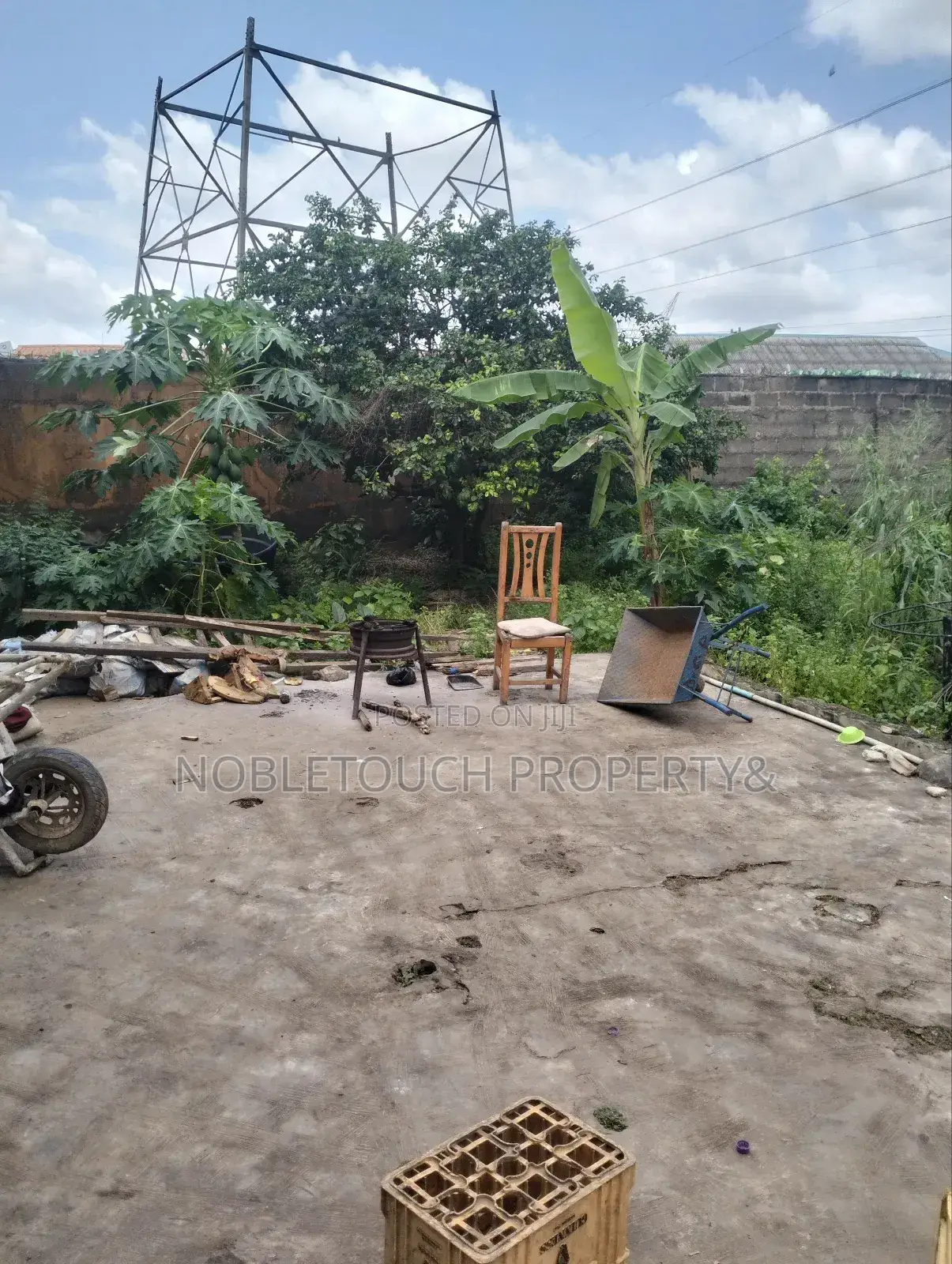 Dry Table Land With 4-Shops at Oluwaga Ipaja Ayobo Lagos in Ipaja