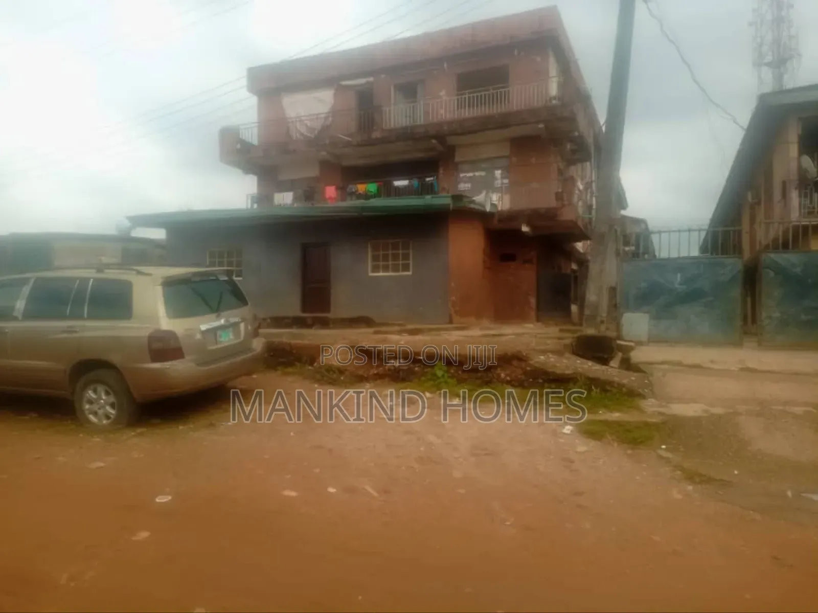 900sqm Land With Upstairs Off Branco Street, Mafoluku Oshodi in Oshodi