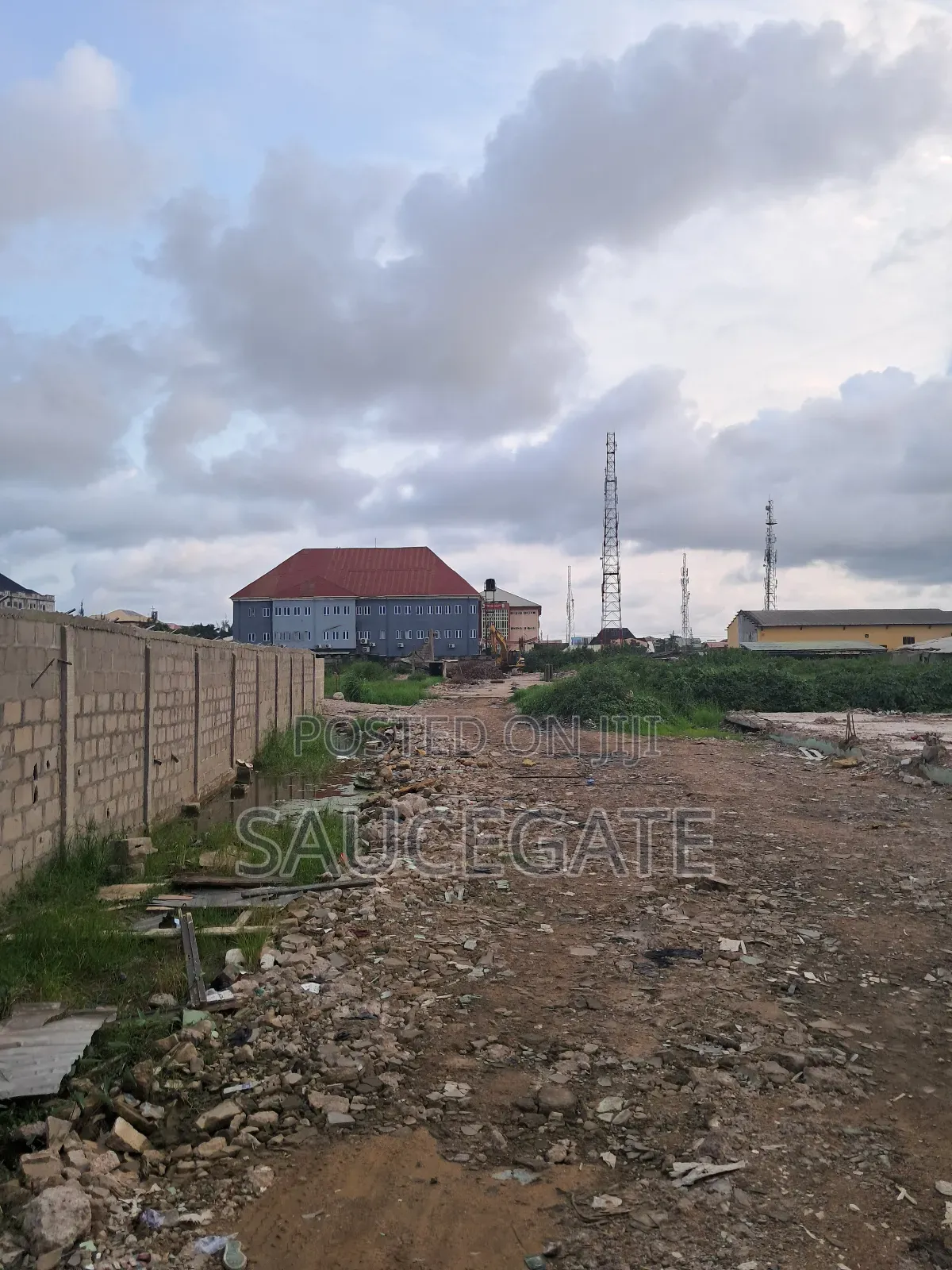 Dry Land on the Road Comercial at Satellite Abuleado C of O Survey in Satellite Town