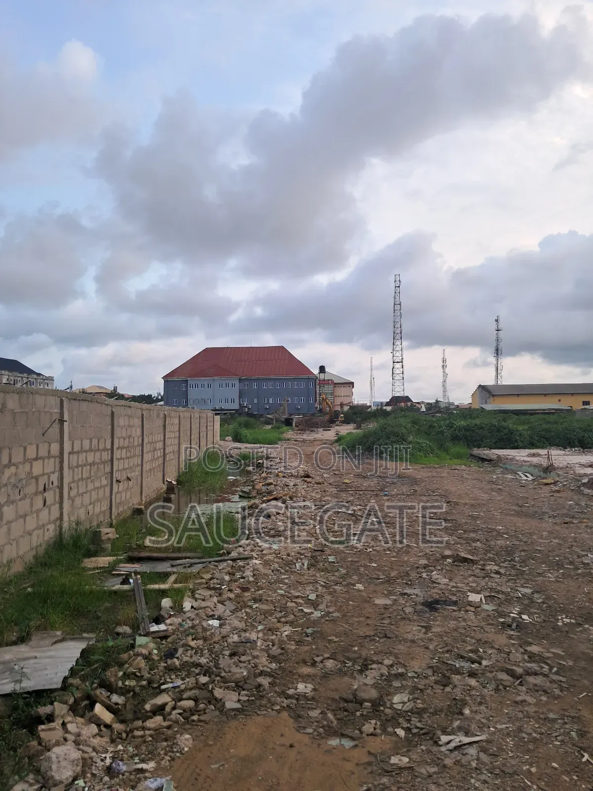 Dry Land on the Road Comercial at Satellite Abuleado C of O Survey in Satellite Town