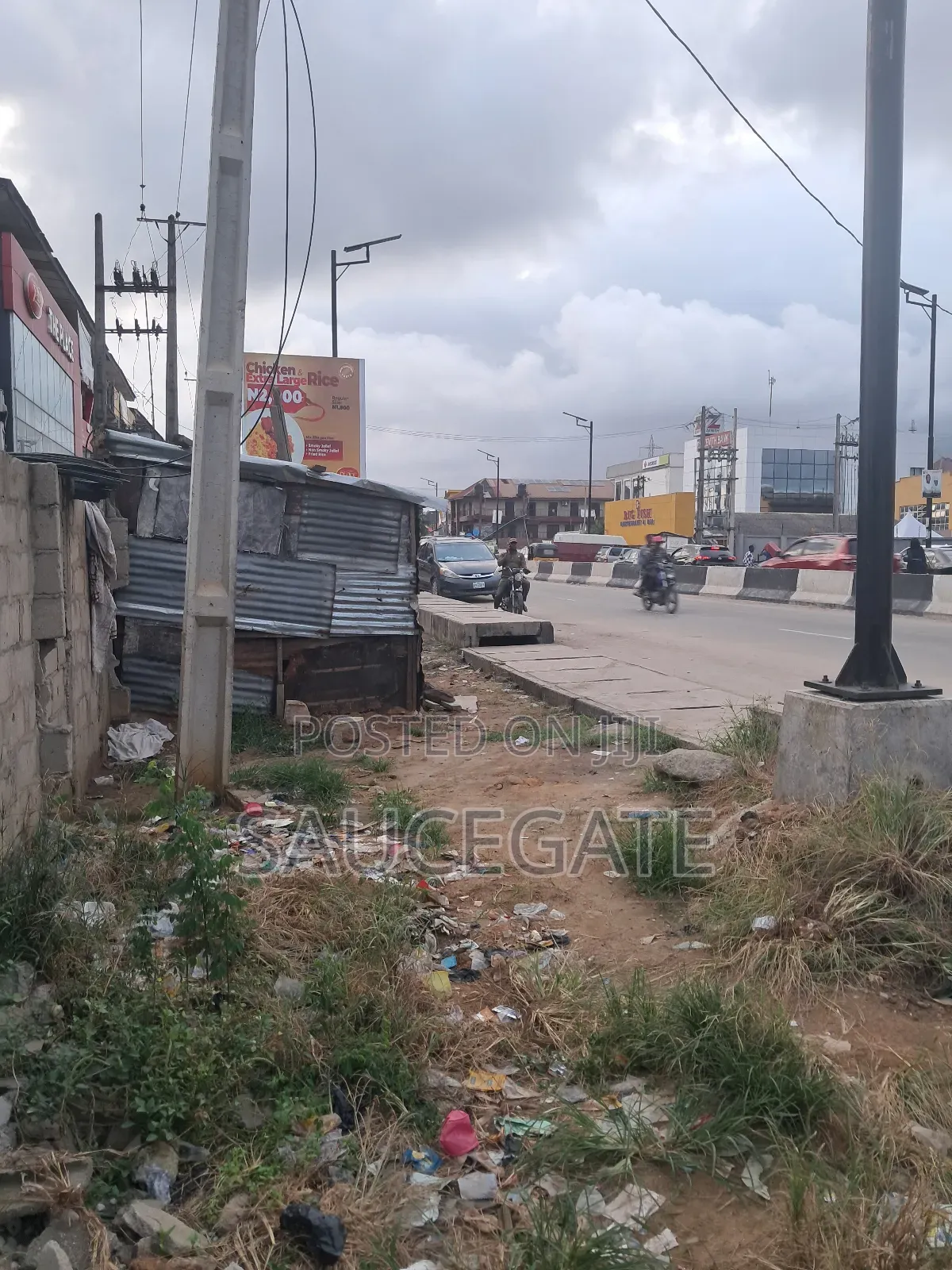 Dry Land on the Road Comercial at Satellite Abuleado C of O Survey in Satellite Town
