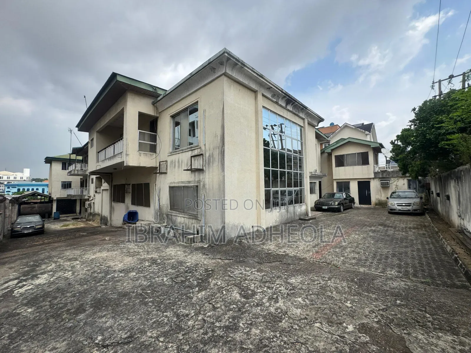Land Measuring 1200sqm With a Building Which Consists of 22rooms For in Opebi