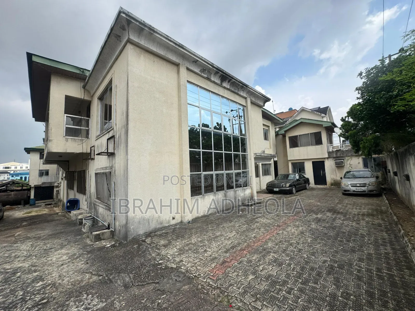 Land Measuring 1200sqm With a Building Which Consists of 22rooms For in Opebi