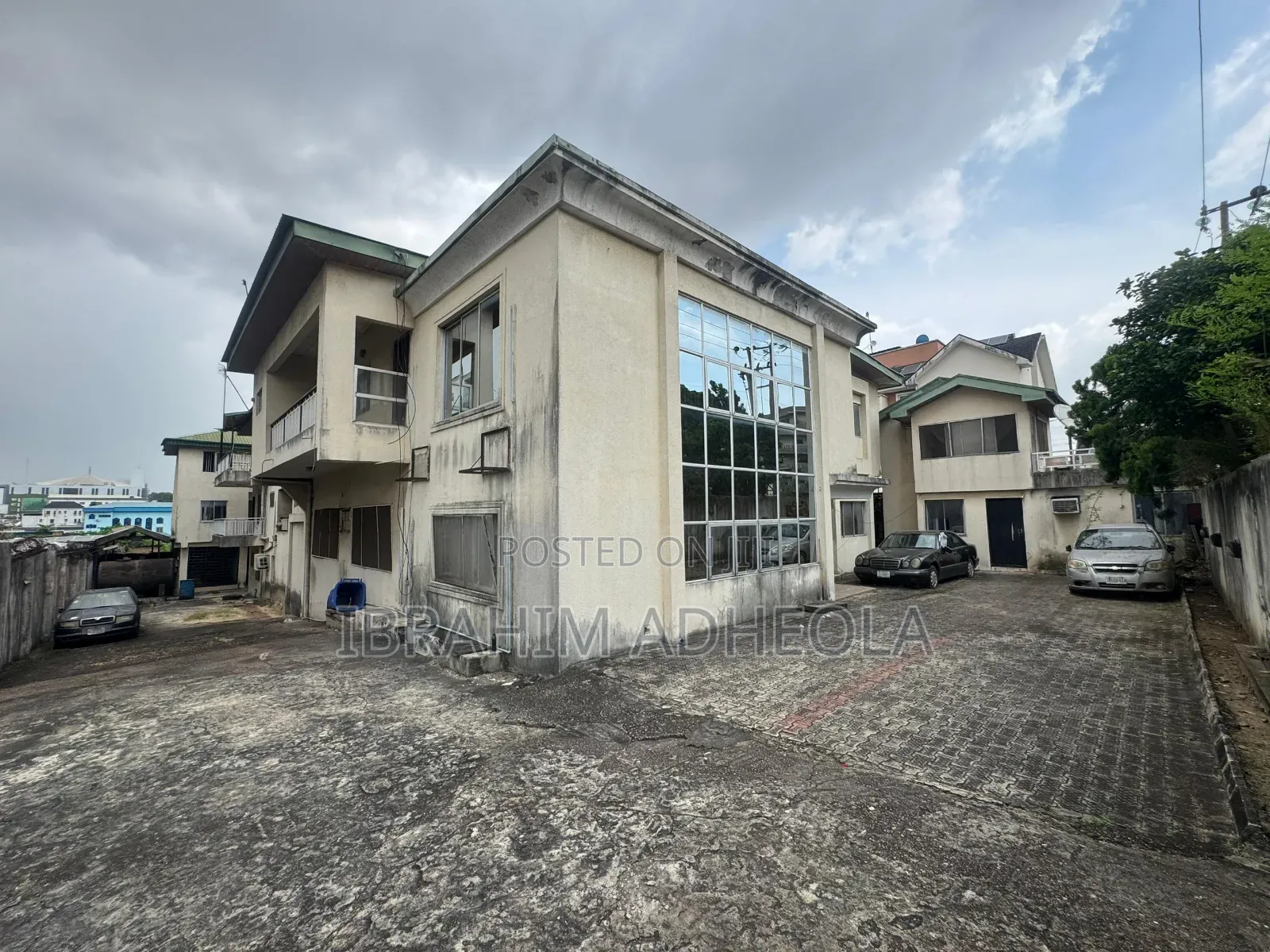 Land Measuring 1200sqm With a Building Which Consists of 22rooms For in Opebi