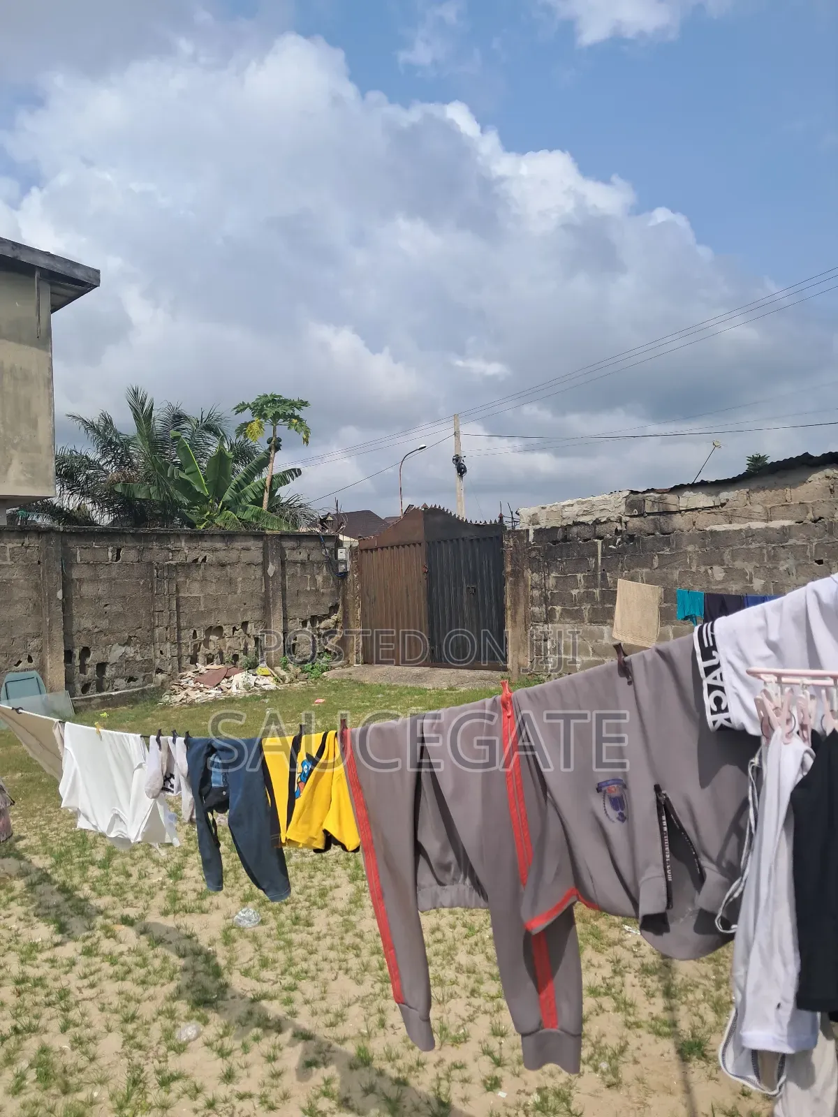 A Dry Land Fenced for Sale at Mobil Road Satellite Town C of O in Satellite Town