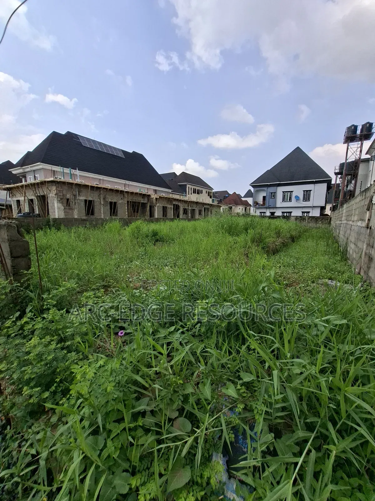 Dry Land With Foundation in an Interlocked Estate in Ago Palace