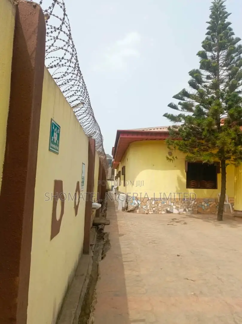 Hotel for Sale at Alakuko Lagos State on a Tiled Road in Alakuko