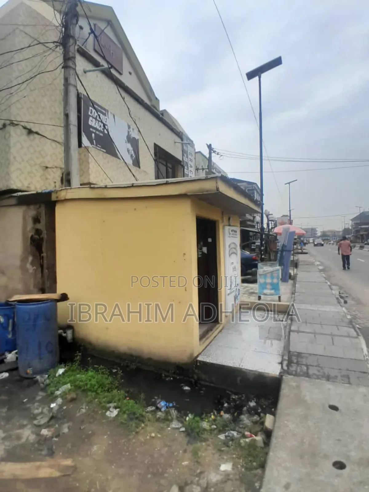 A Land With Commercial Building in Akoka
