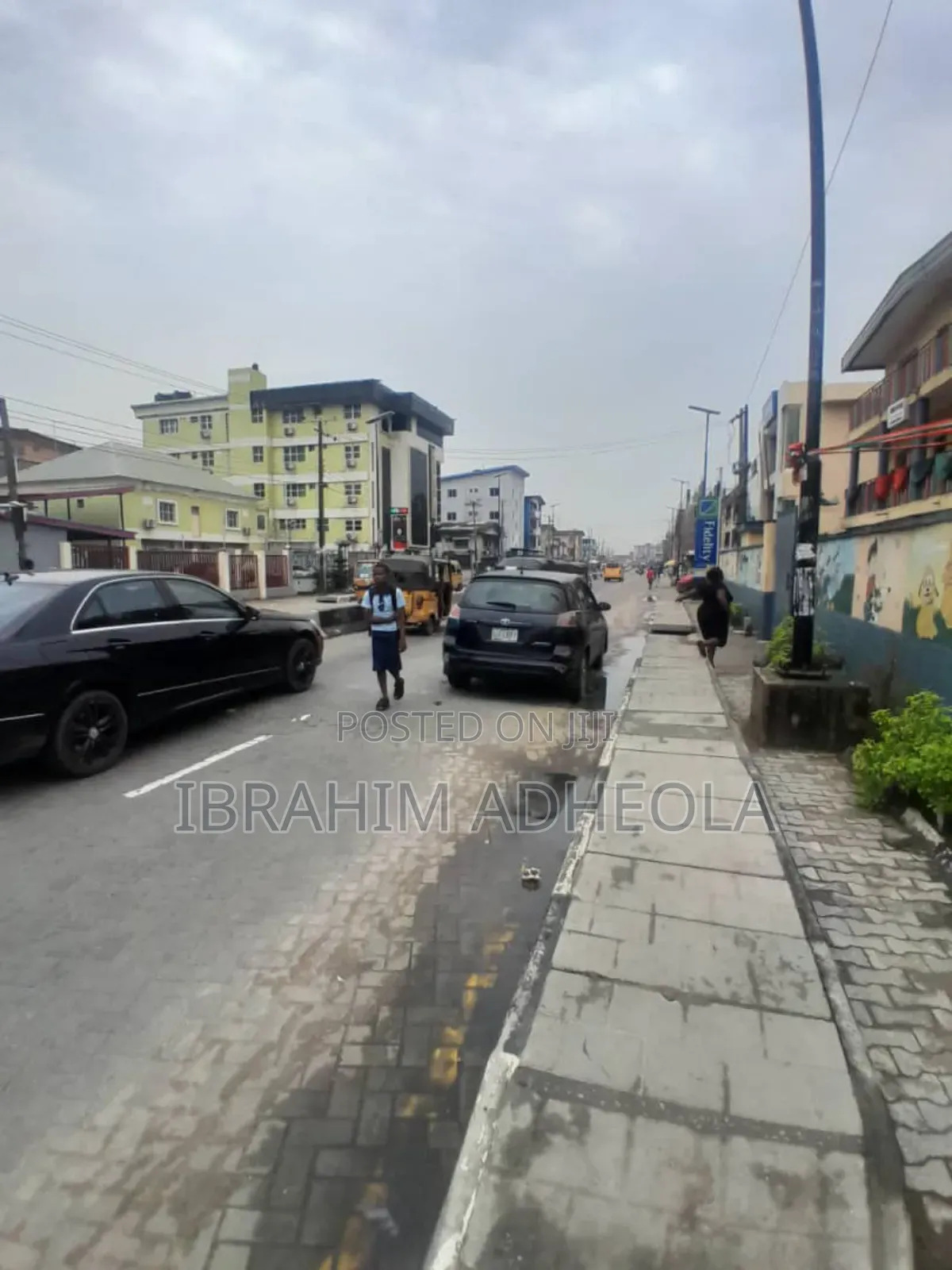 A Land With Commercial Building in Akoka