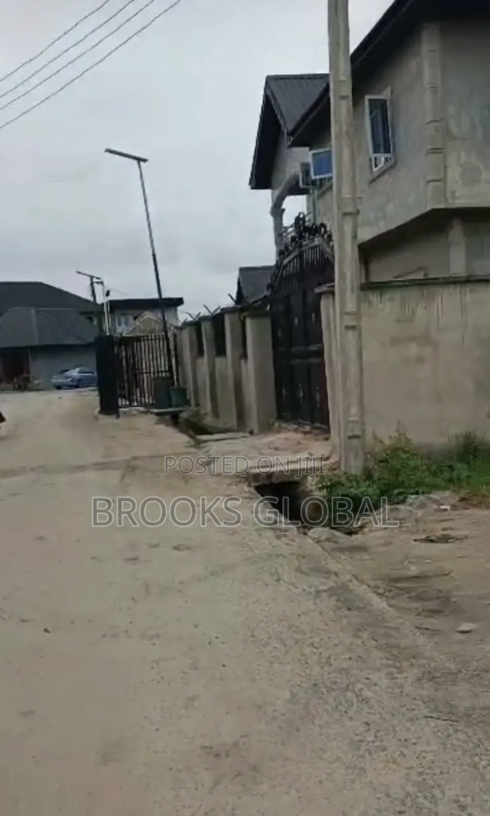 A Land of 100/100 on Tiled Road at Nigercat Warri for Sale in Warri