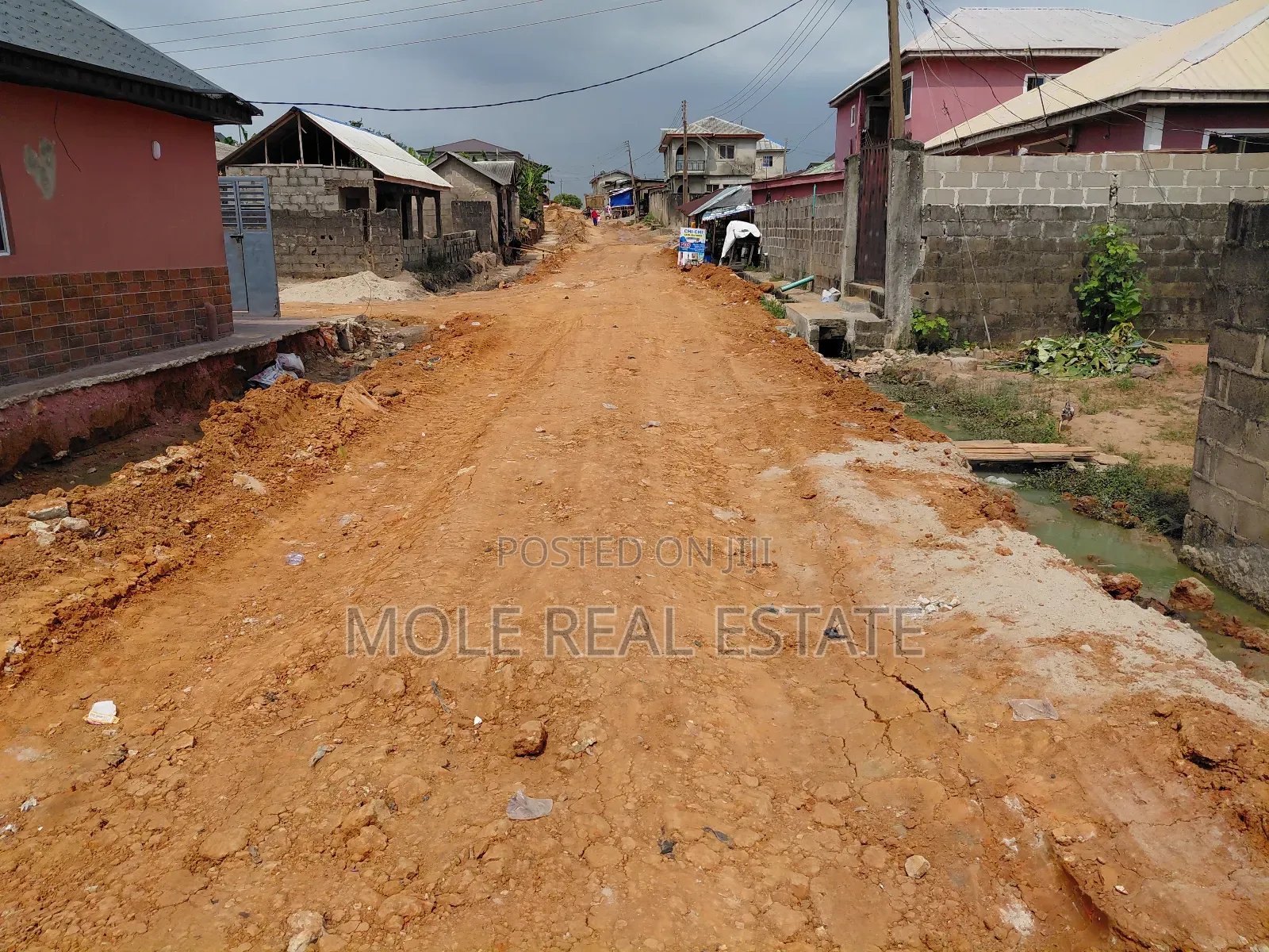 Distress Half Plot Ijegemo New Road by Bustop in Ijegun