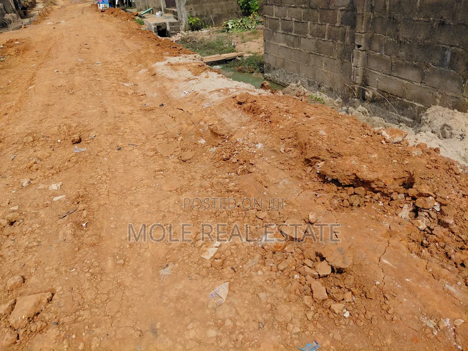 Distress Half Plot Ijegemo New Road by Bustop in Ijegun