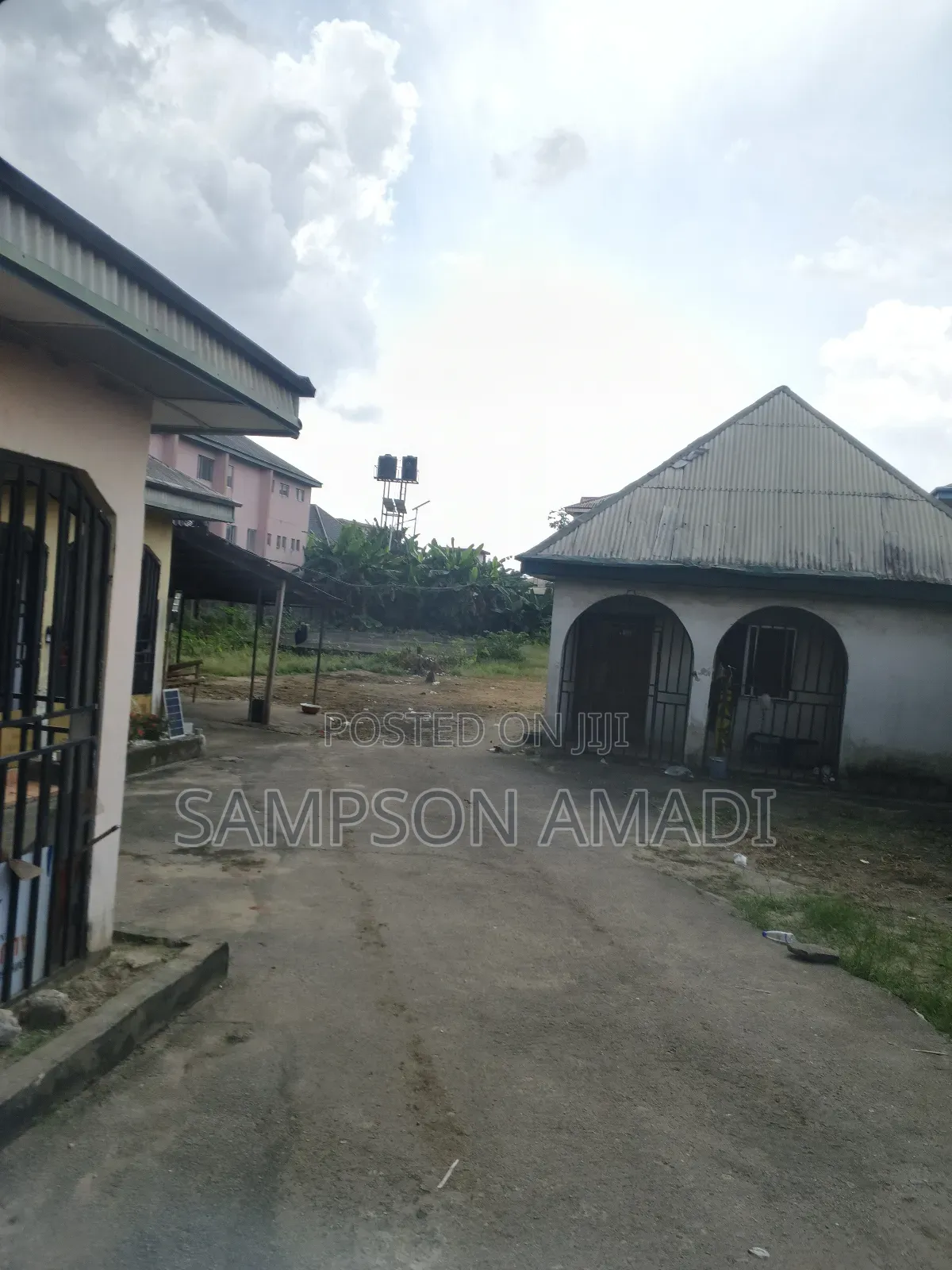 Four and Half Plot of Land for Sale With Buildings Inside in East West Road