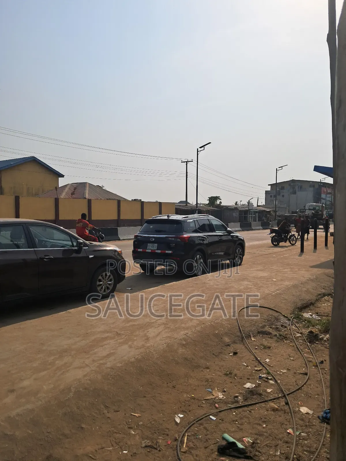 Land Busy Road at Abuleado Satellite Old Ojo Road Next to Zenith Bank in Satellite Town