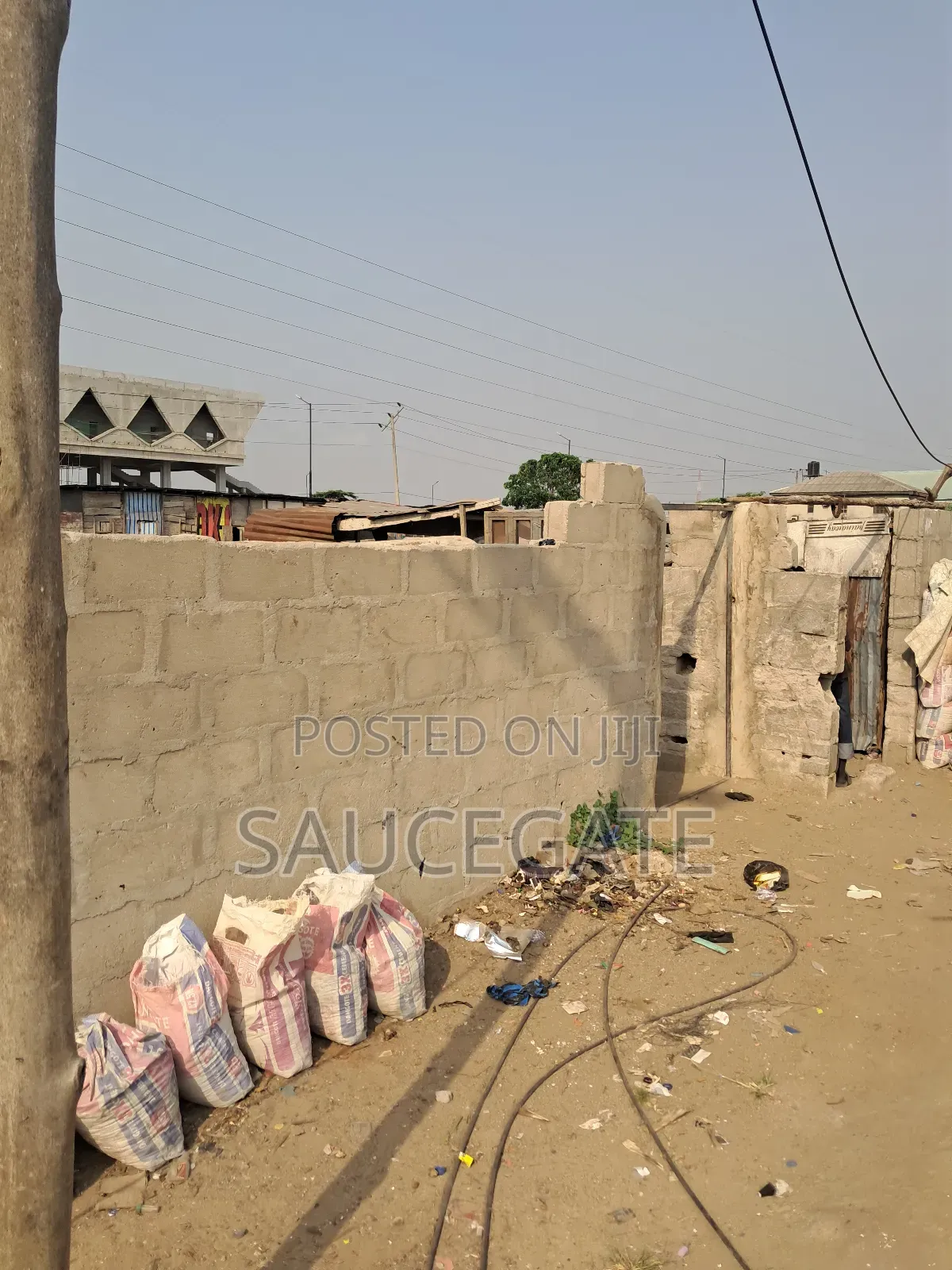 Land Busy Road at Abuleado Satellite Old Ojo Road Next to Zenith Bank in Satellite Town