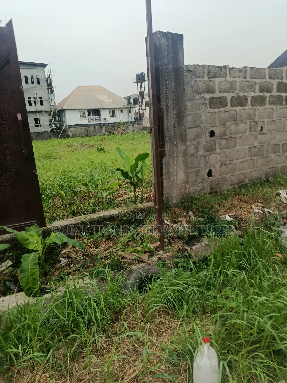 30 by 150 Plot of Land in a Secured Estate in Ago Palace