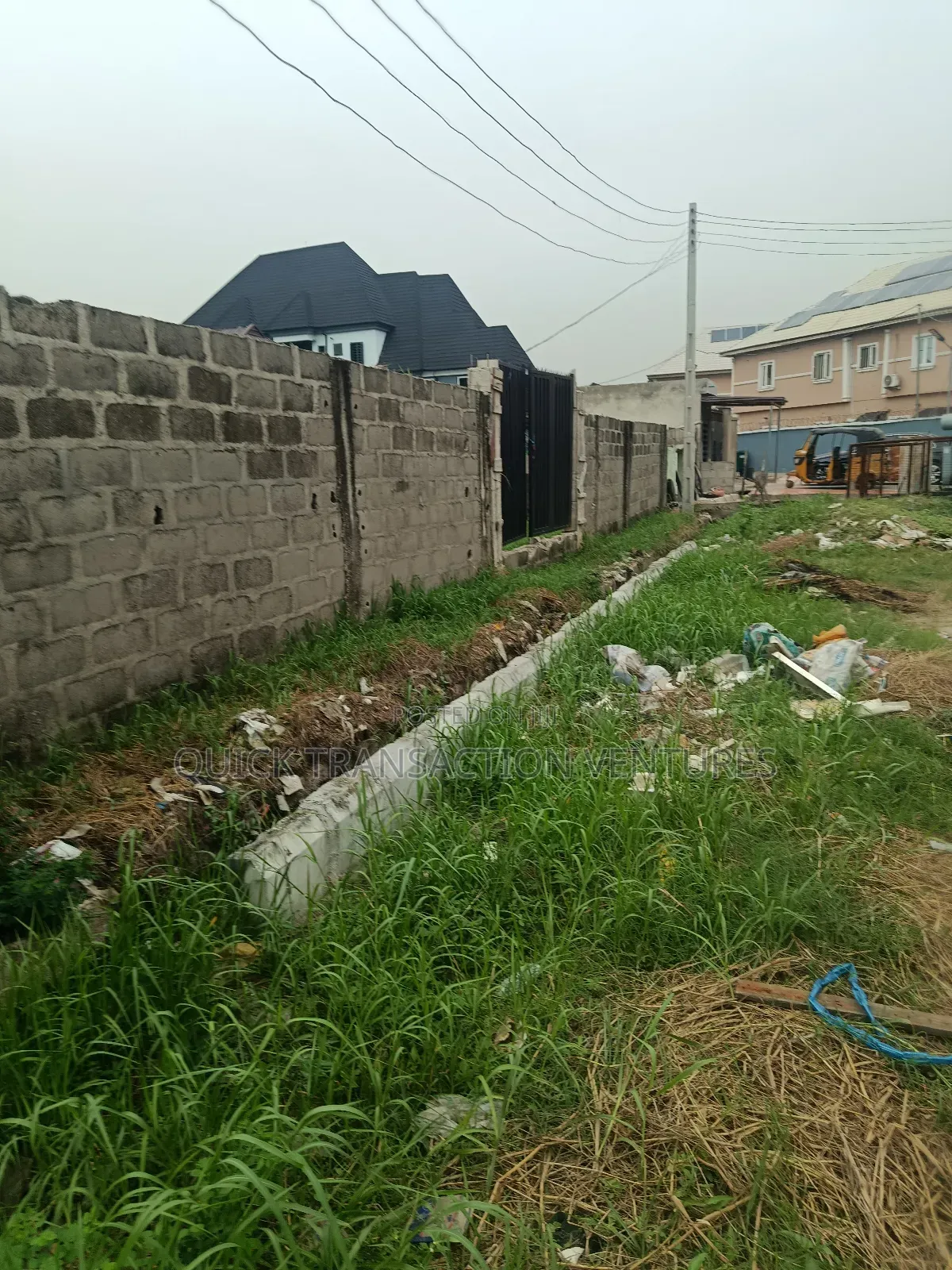 30 by 150 Plot of Land in a Secured Estate in Ago Palace