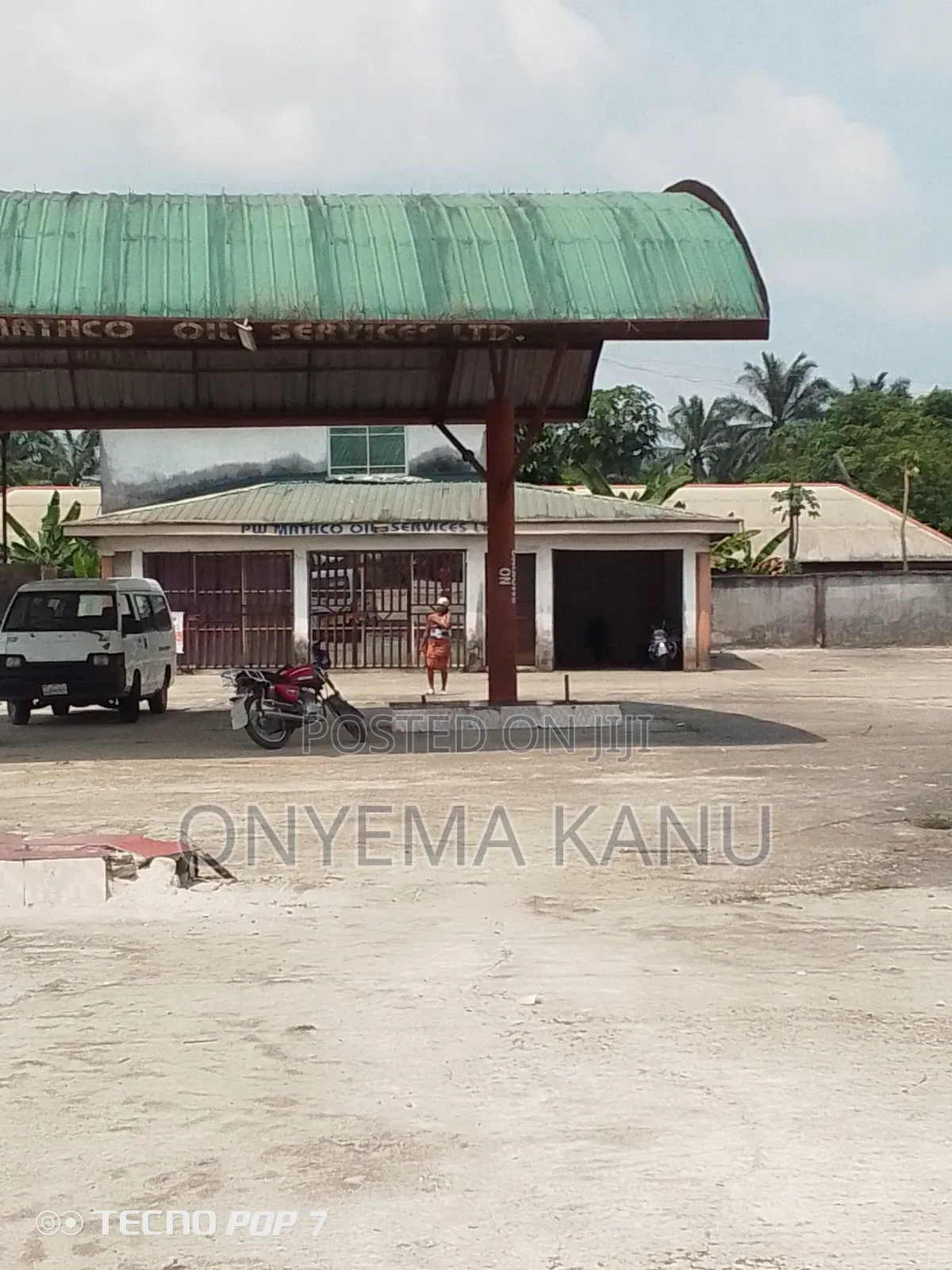 Filling Station With Block of Flats. in Ukwa