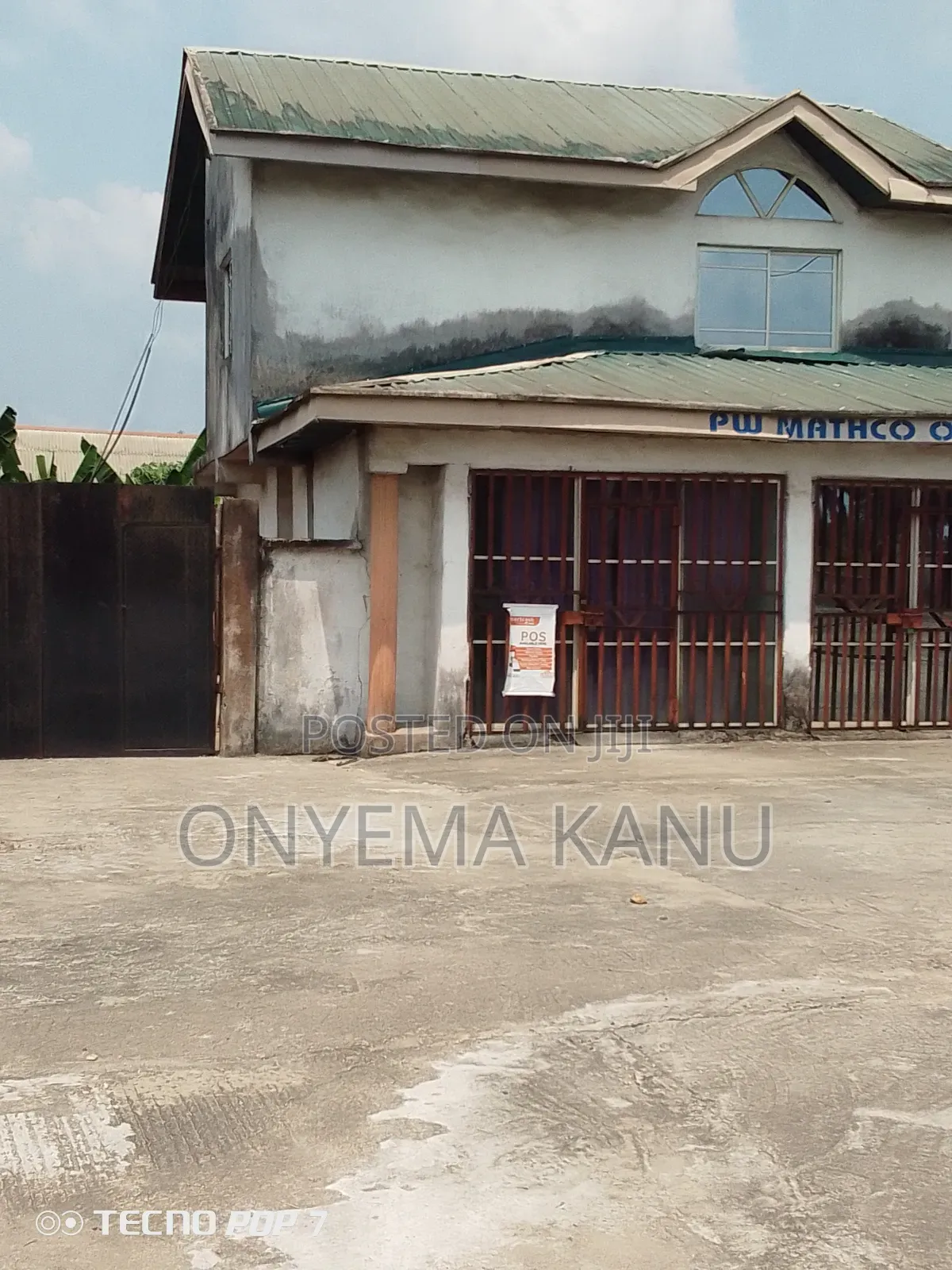Filling Station With Block of Flats. in Ukwa