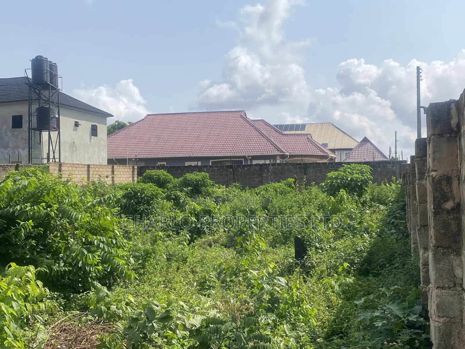 Genuine 50ft by 80ft in Ogumwenyin by Waec Office Tarred Road for Sale in Benin City