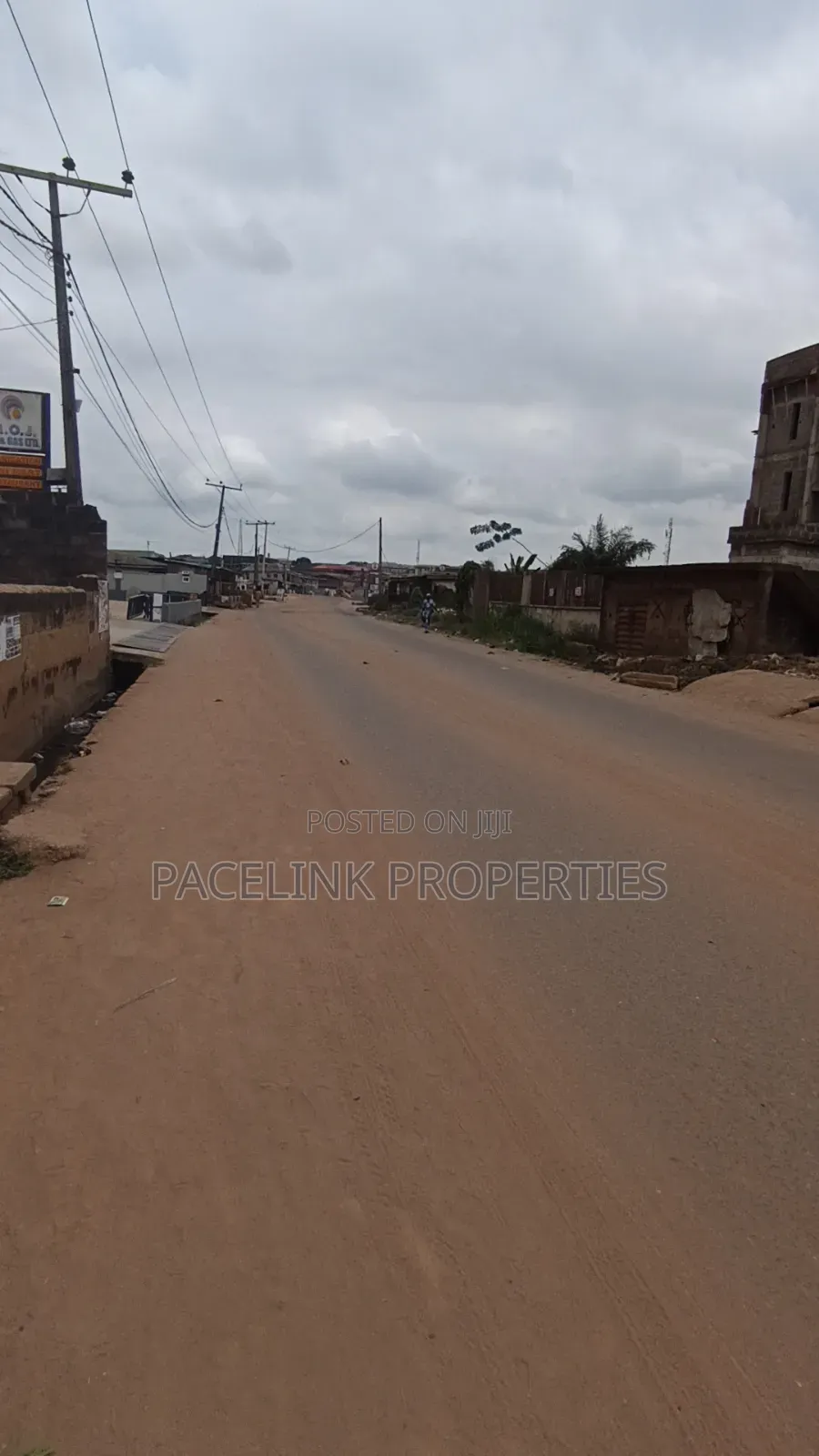 2 Plot Together on a Tarred Road in Ipaja