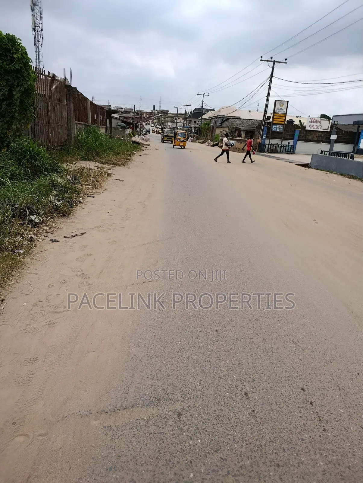 2 Plot Together on a Tarred Road in Ipaja