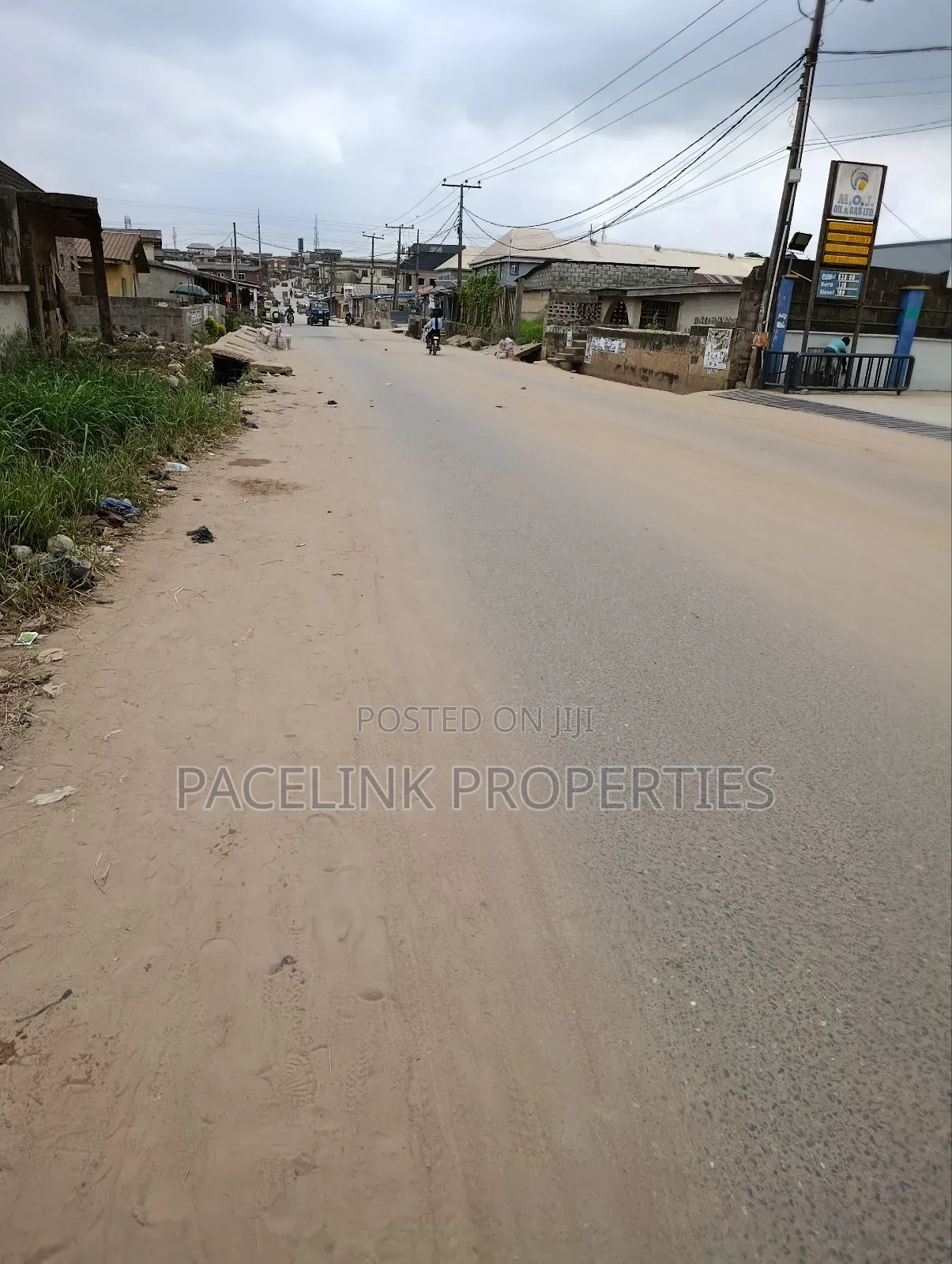 2 Plot Together on a Tarred Road in Ipaja