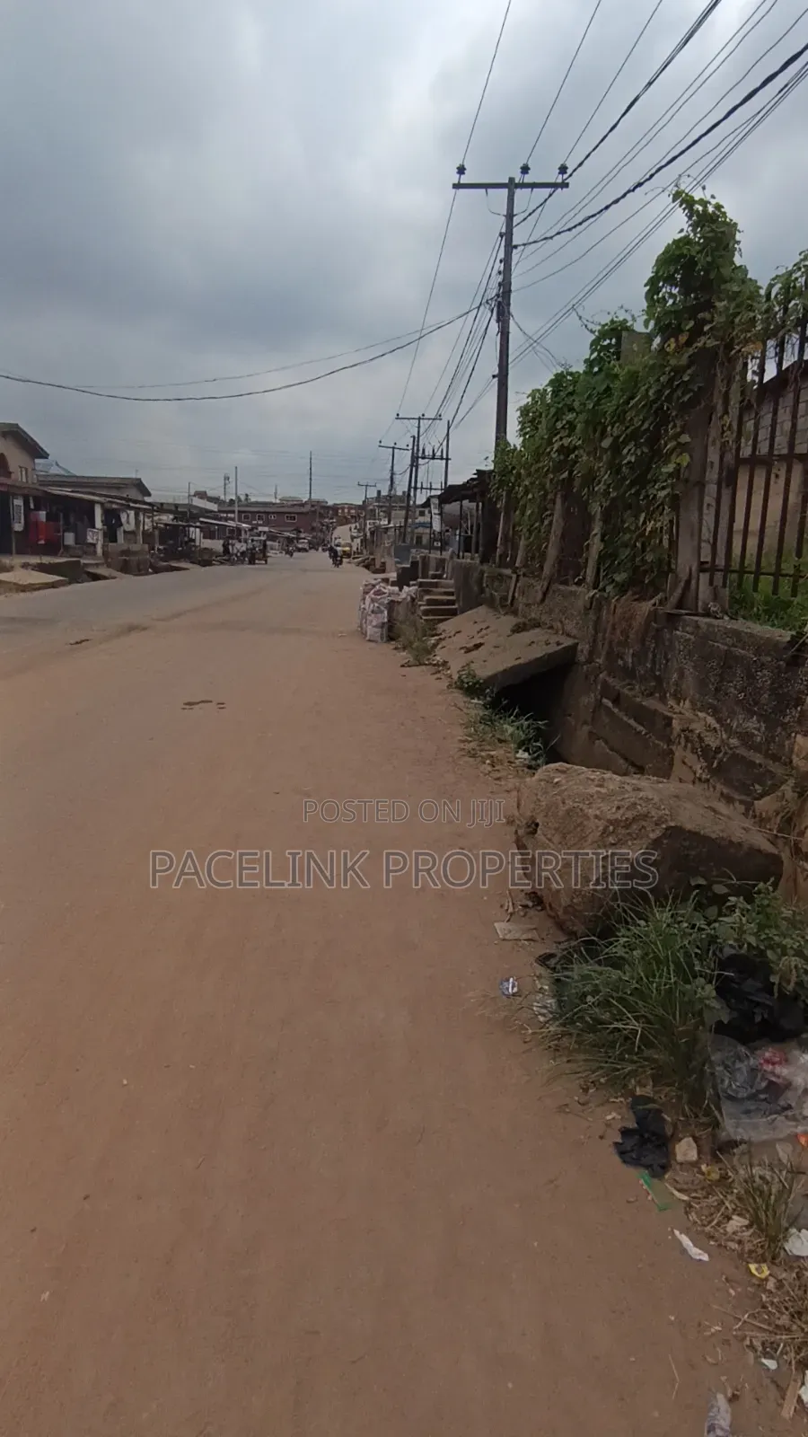 2 Plot Together on a Tarred Road in Ipaja