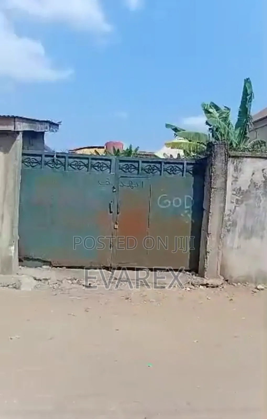 A Plot of Land Fenced With Gate, With 5 Shops. in Ojo