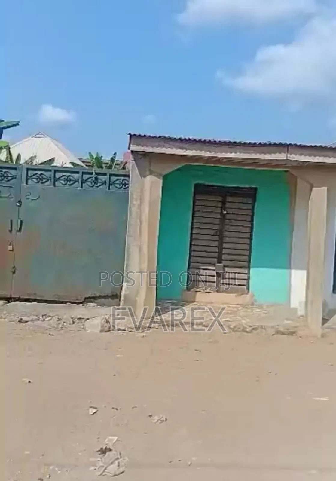 A Plot of Land Fenced With Gate, With 5 Shops. in Ojo
