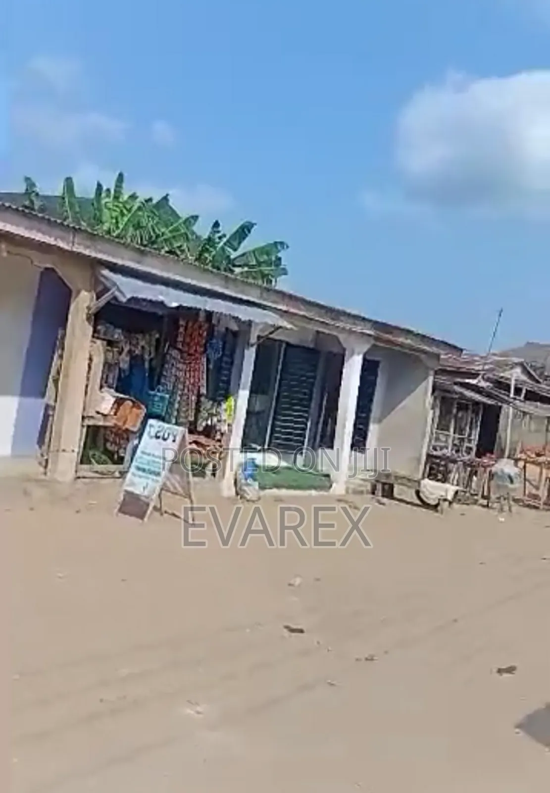 A Plot of Land Fenced With Gate, With 5 Shops. in Ojo