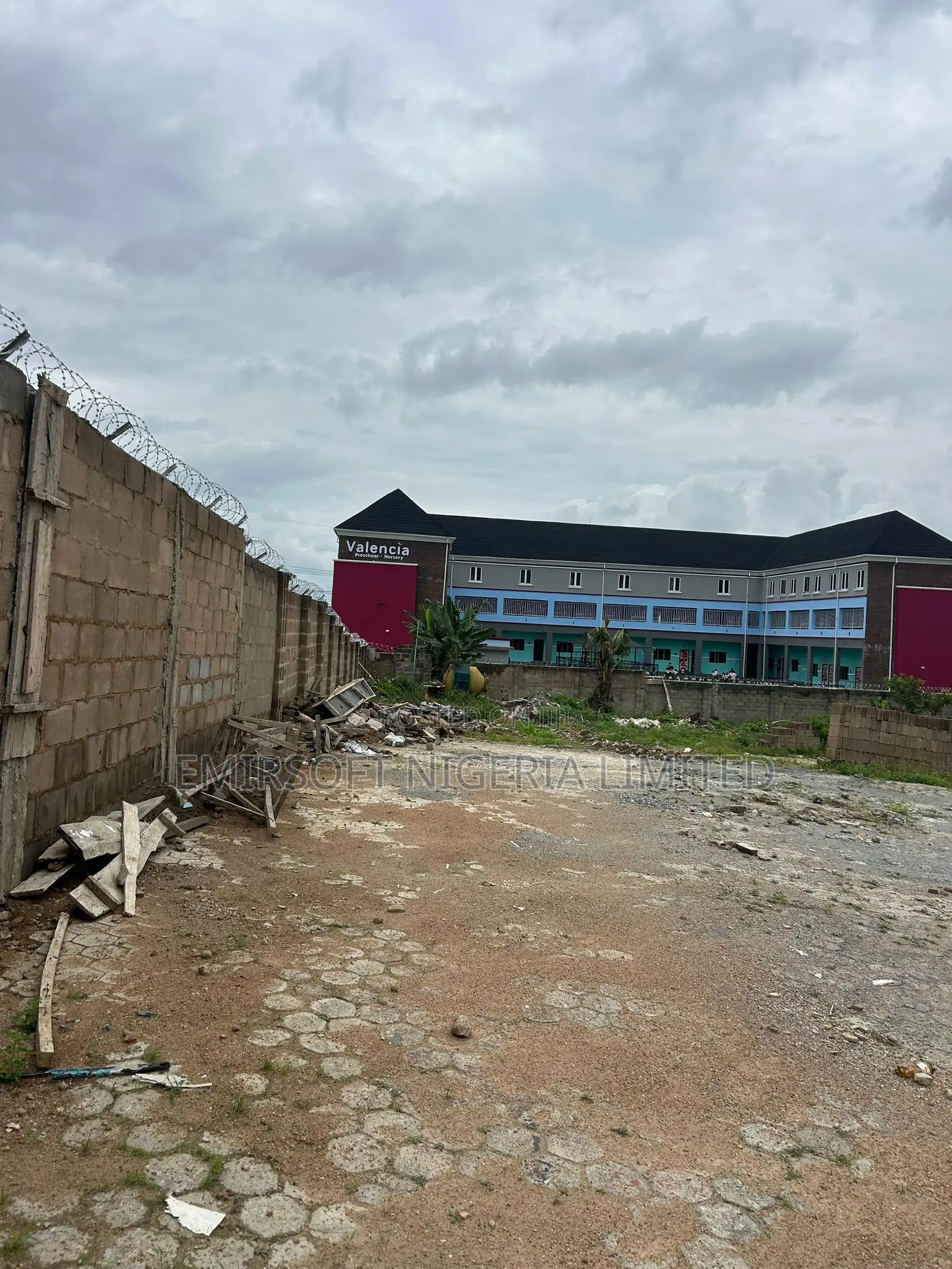 An Acre of Commercial Land, With a Duplex, Warehouse in Oluyole in Oluyole