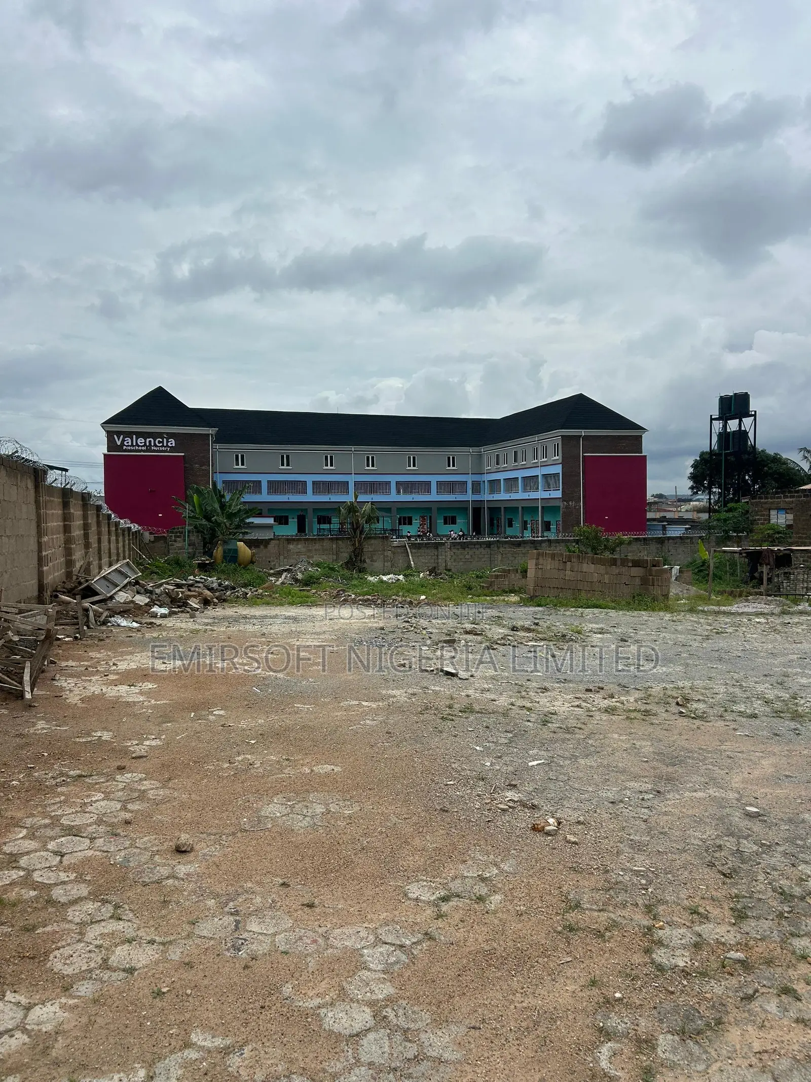 An Acre of Commercial Land, With a Duplex, Warehouse in Oluyole in Oluyole