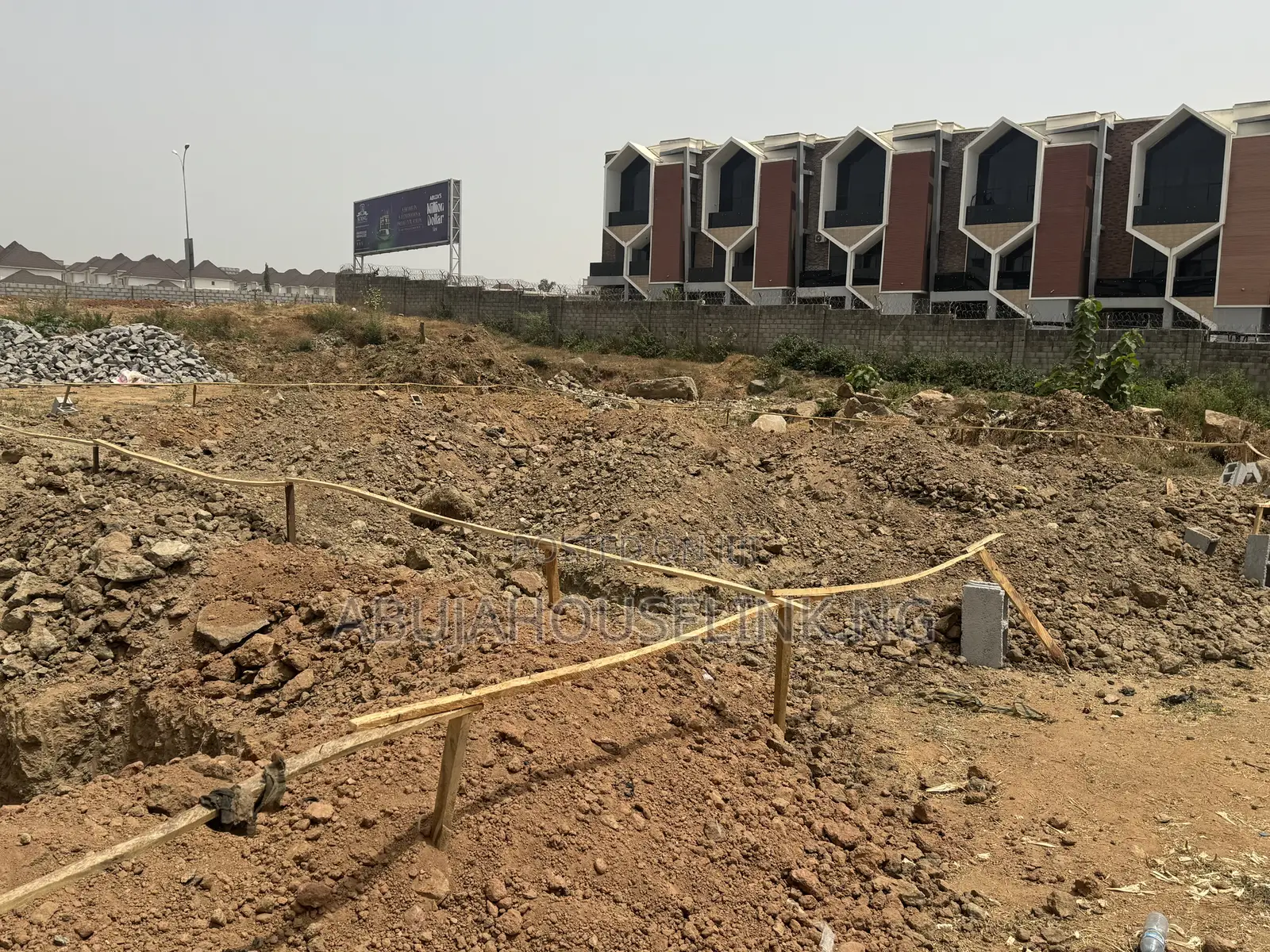 400sqm Fcda Cofo Plot Available in a Built Up Area in Guzape District