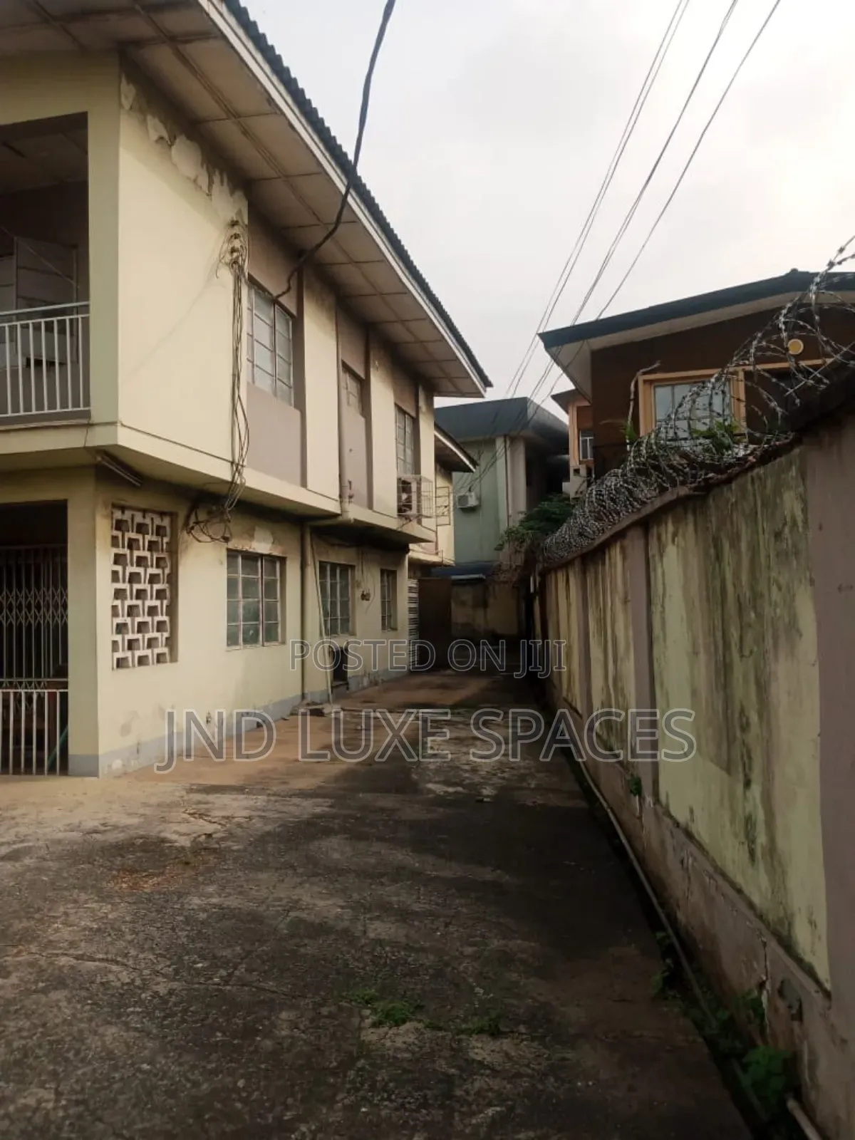 Two Wings Duplex of Five Bedrooms Each Suitable for a Corporate Office in Toyin Street