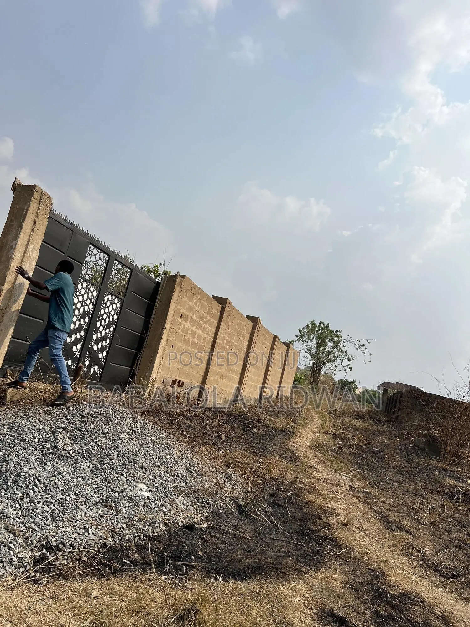 A Standard Plot of Land Well Fence and Gated in Akala Express