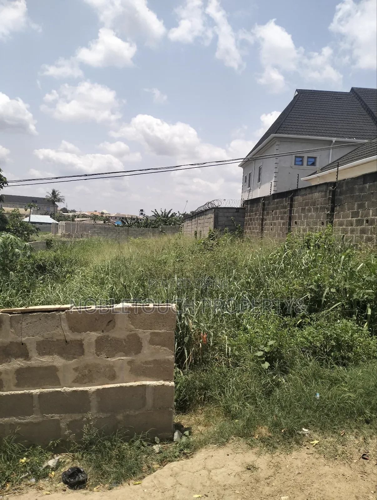 140by 40ft Land at Off Lanre Bus Stop Igando New Town in Iseri Olofin