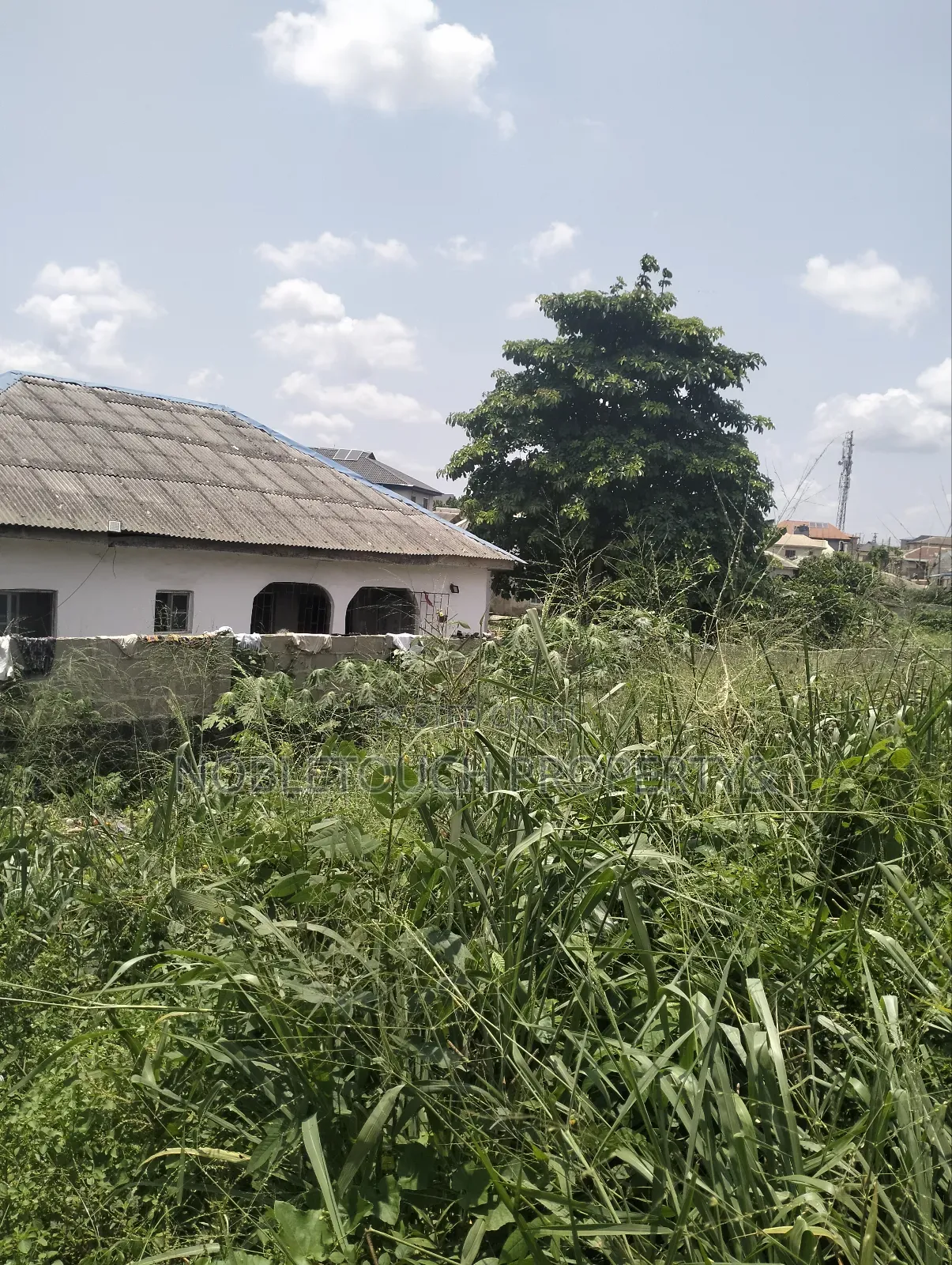 140by 40ft Land at Off Lanre Bus Stop Igando New Town in Iseri Olofin