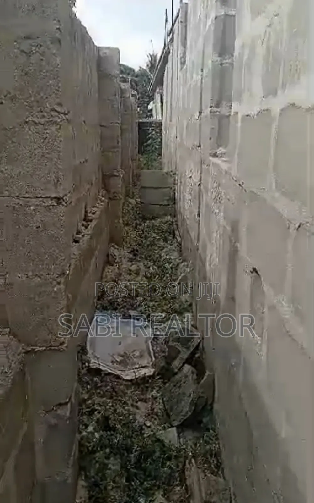 Land for Sale | Aalmost Half Plot of Land With a Structure at Ikotun in Ikotun / Ikotun/Igando