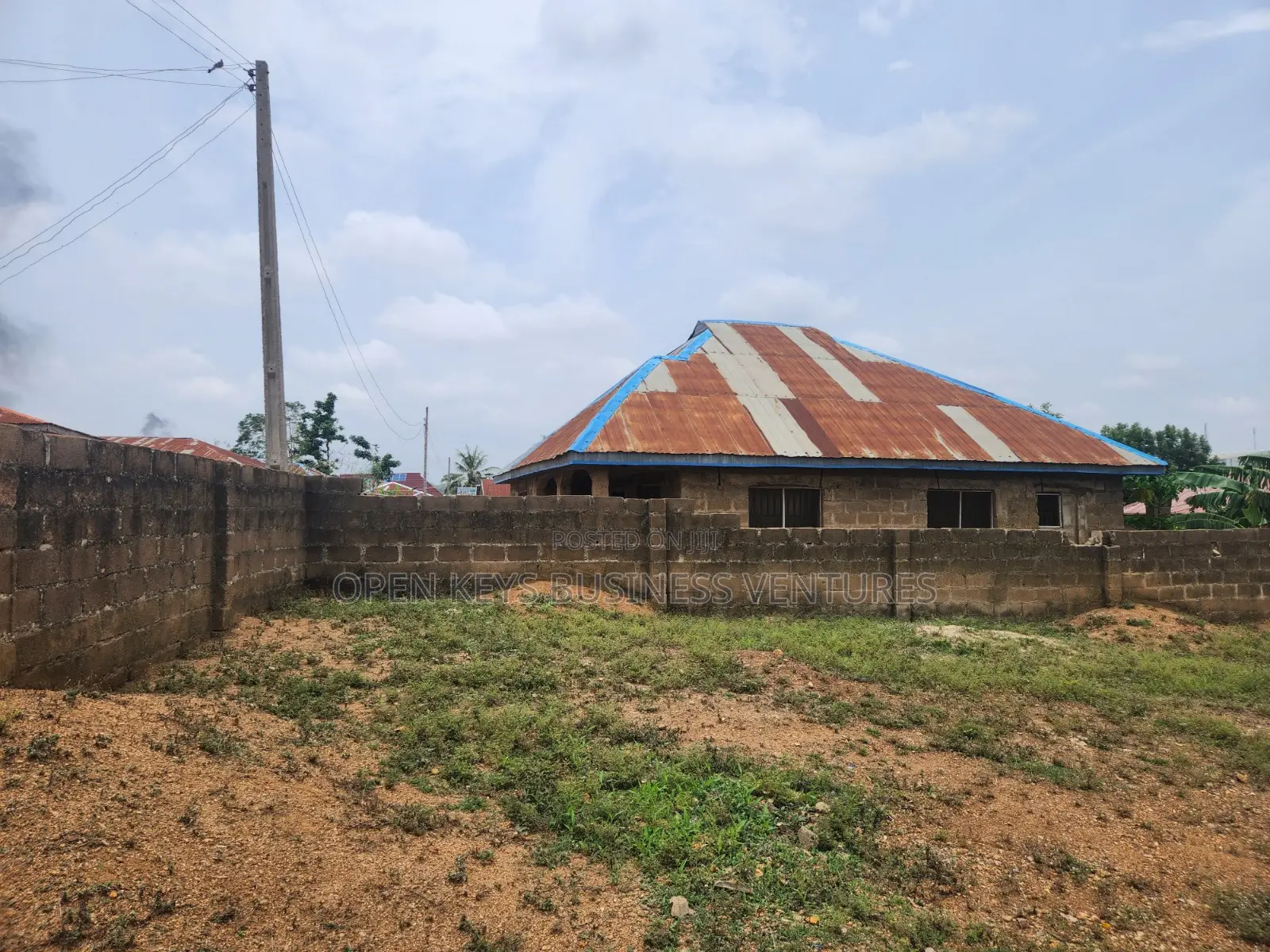 A Fenced Cut-Out Plot of Land in Odo Ona