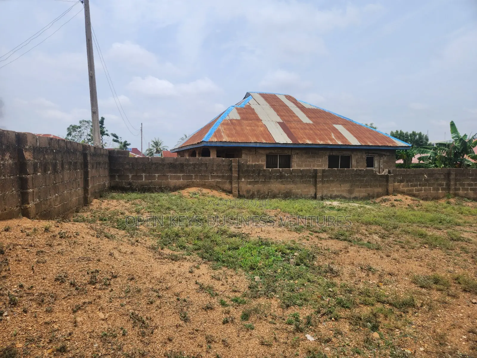 A Fenced Cut-Out Plot of Land in Odo Ona