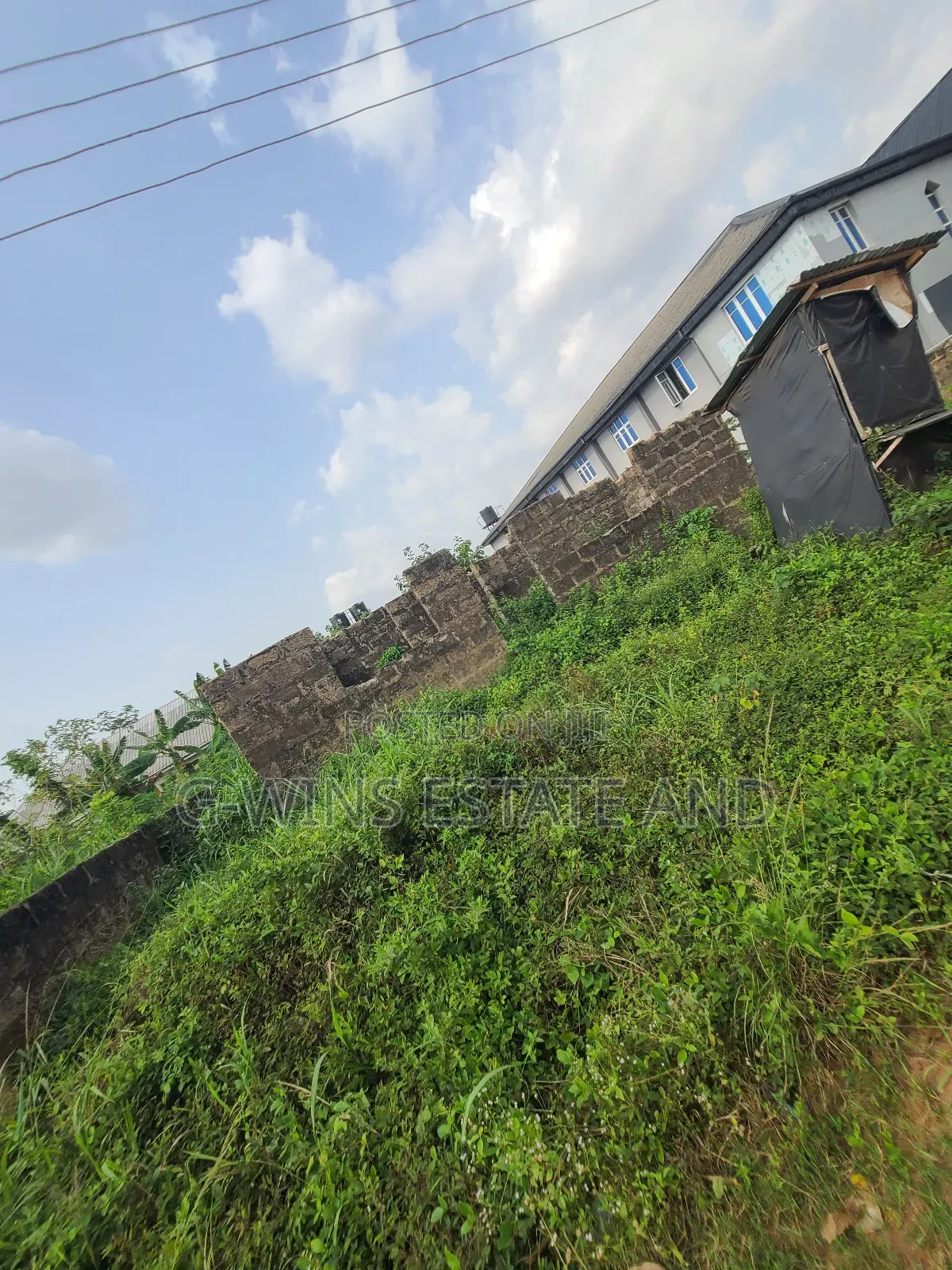 50ft by 100ft at Evbodia Airport Road Extension in Benin City