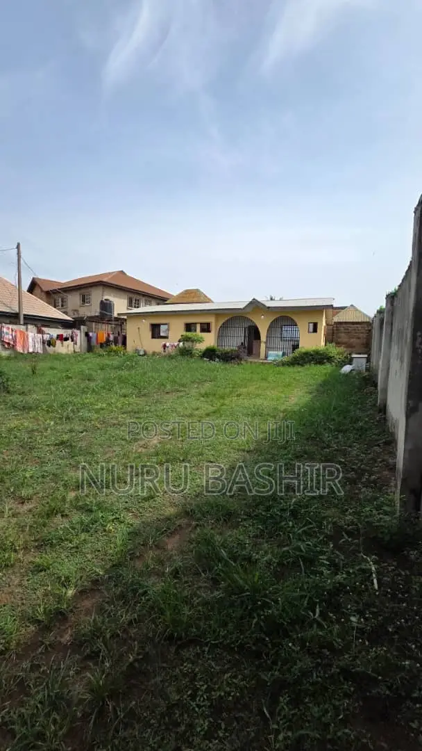 Well Fenced and Gated Plot of Land at Progressive Estate Akala Express in Akala Express
