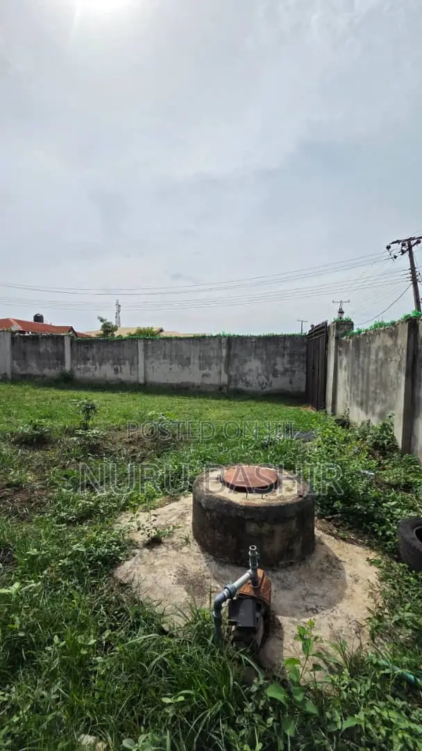 Well Fenced and Gated Plot of Land at Progressive Estate Akala Express in Akala Express