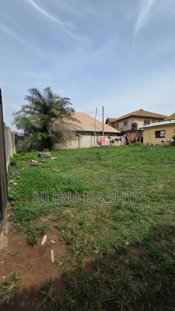 Well Fenced and Gated Plot of Land at Progressive Estate Akala Express in Akala Express