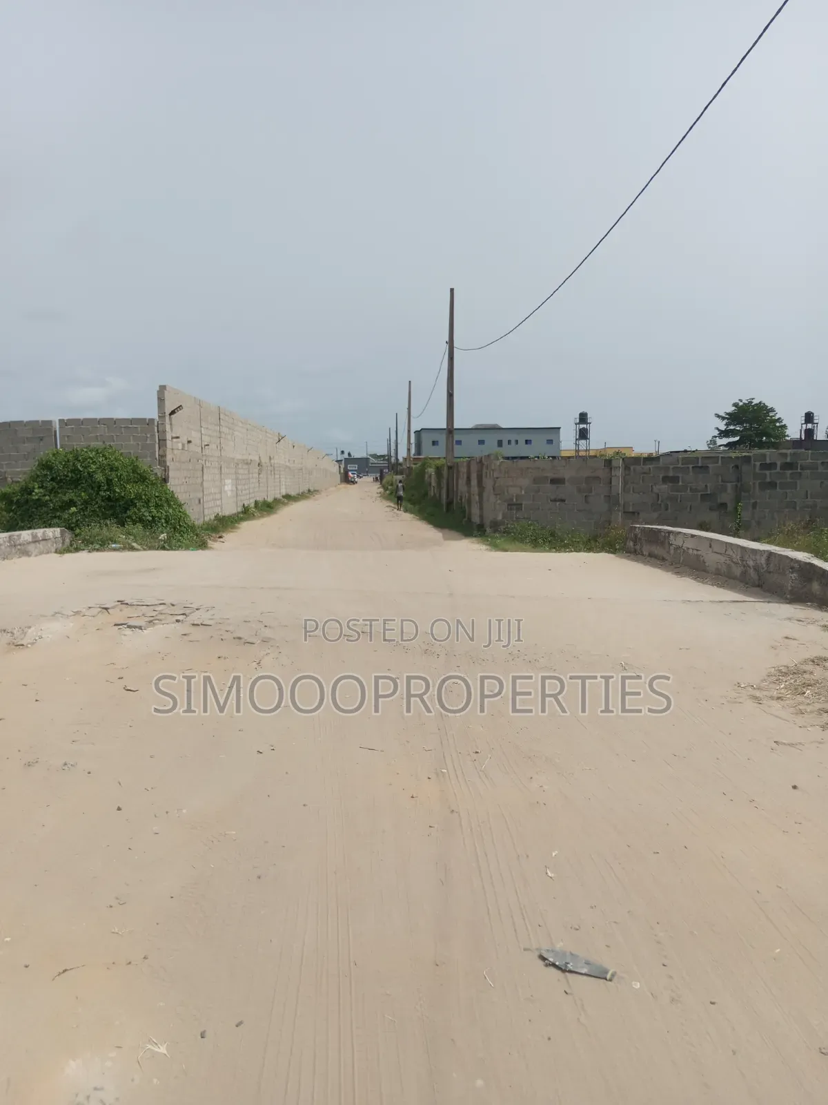 Half Plot of Land for Sale at Onishon, Fenced and Gated in Lakowe