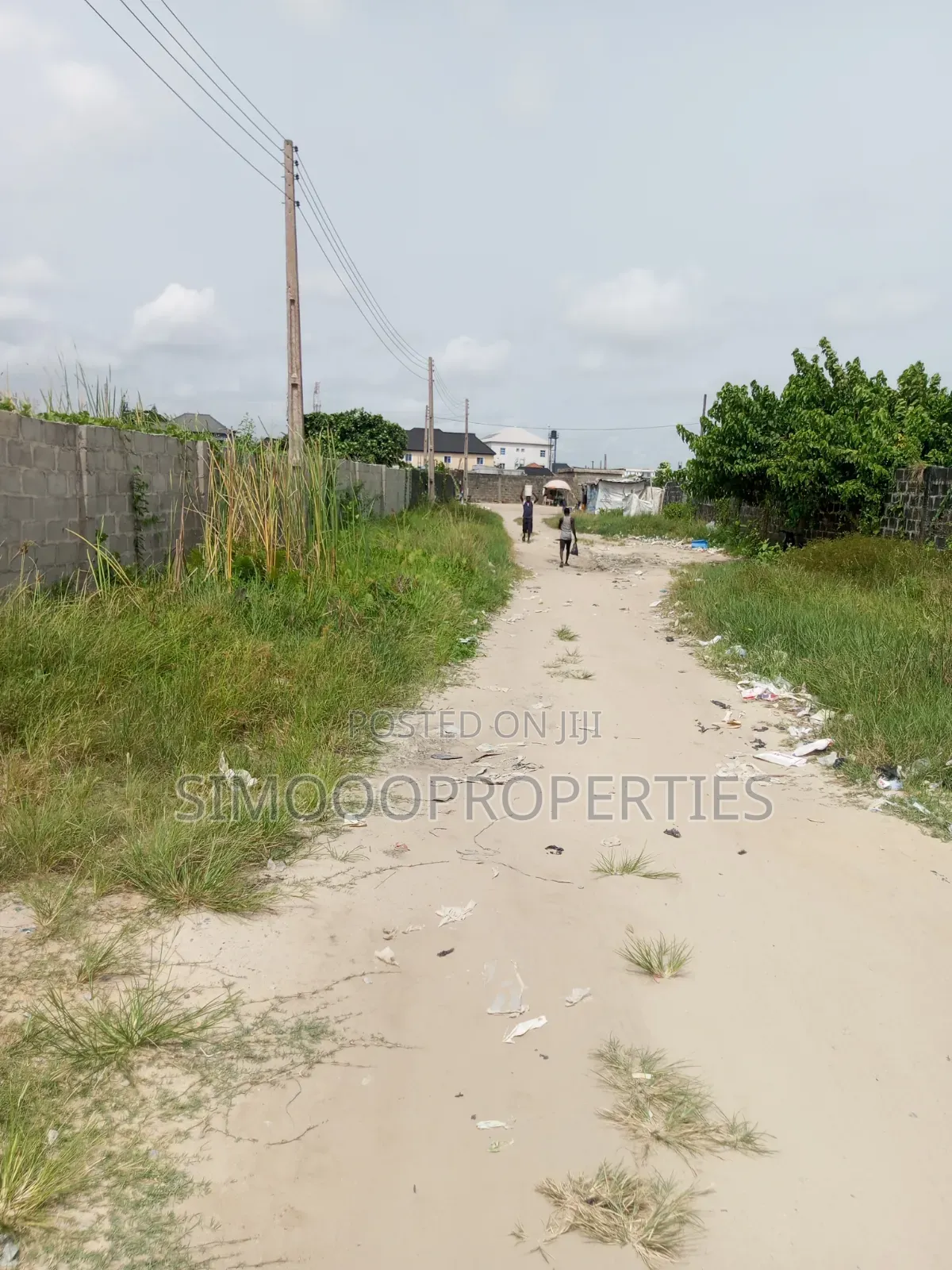 Half Plot of Land for Sale at Onishon, Fenced and Gated in Lakowe